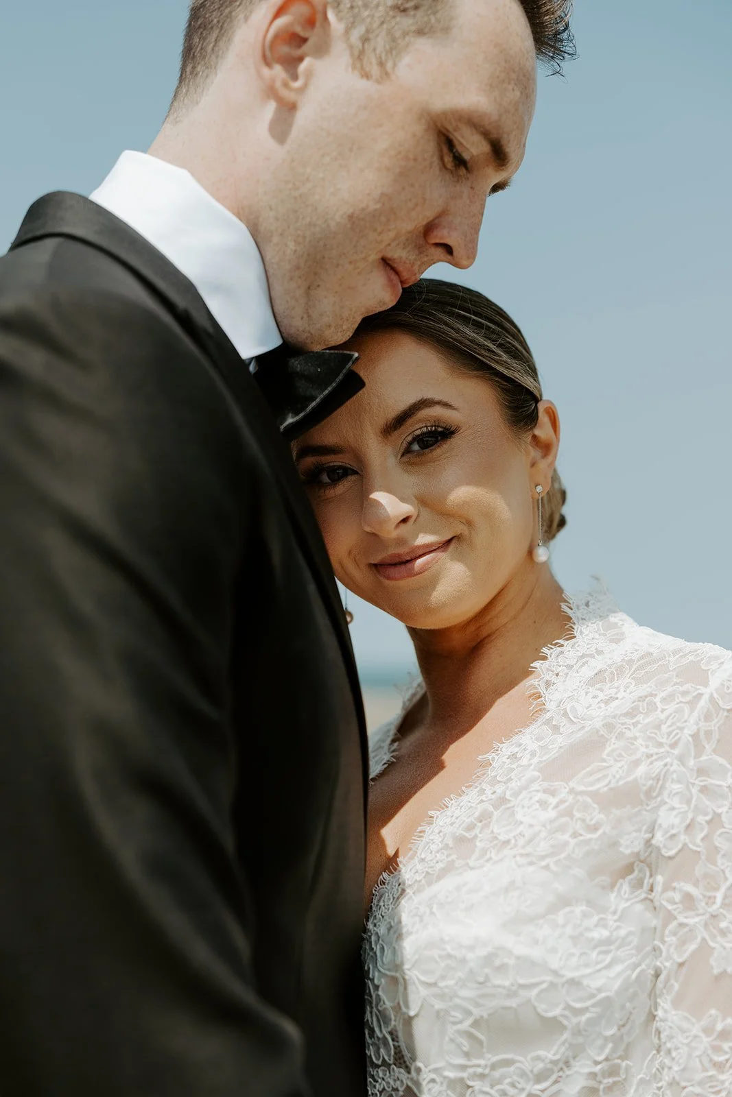 A bride and groom posing for Boston wedding photos