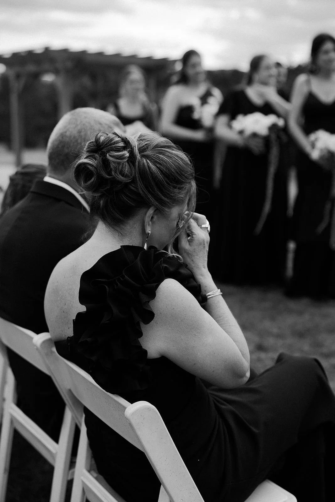 Wedding guests crying during a wedding ceremony