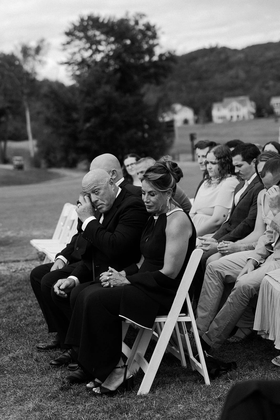 Wedding guests crying during a wedding ceremony