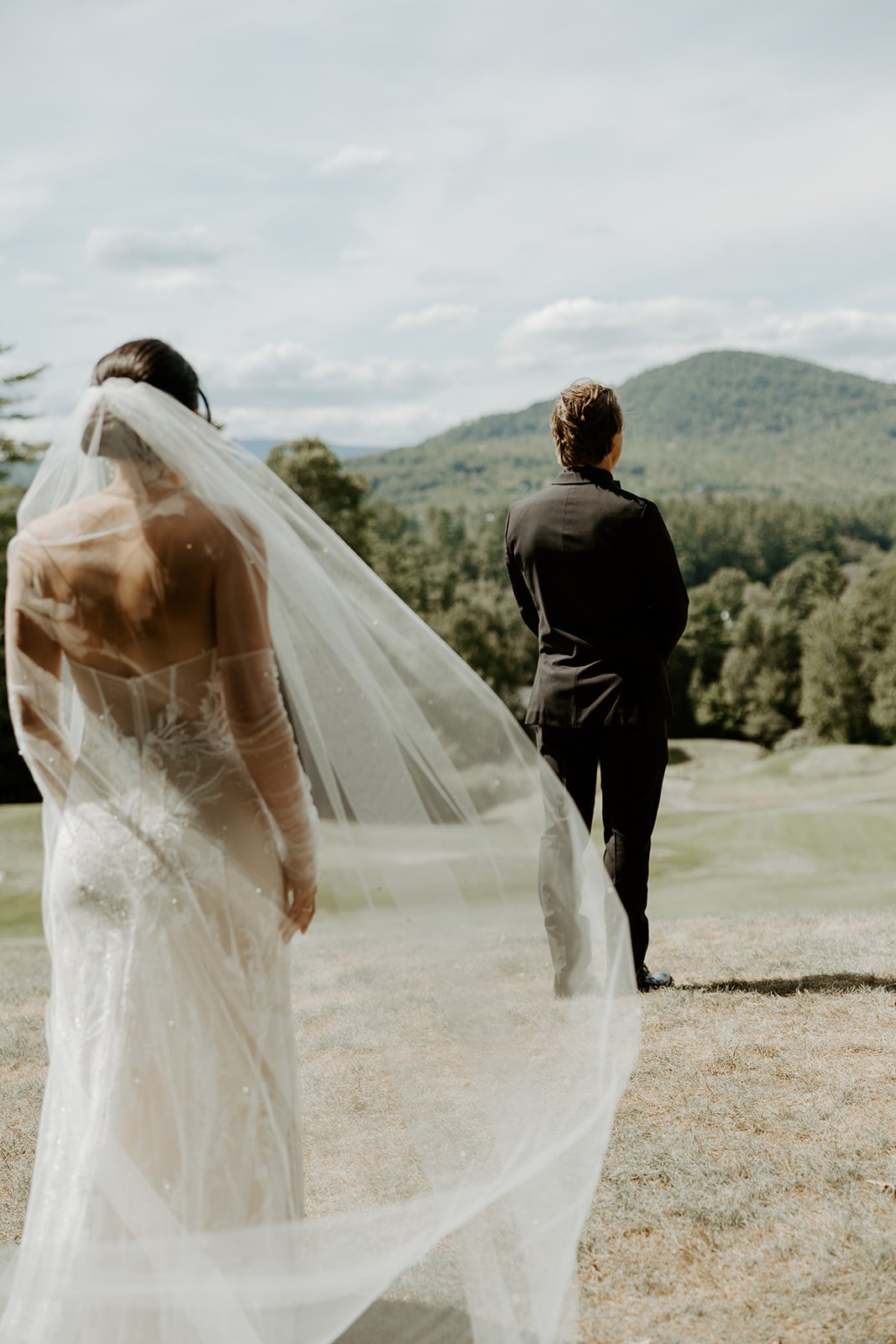 A bride and groom during their first look