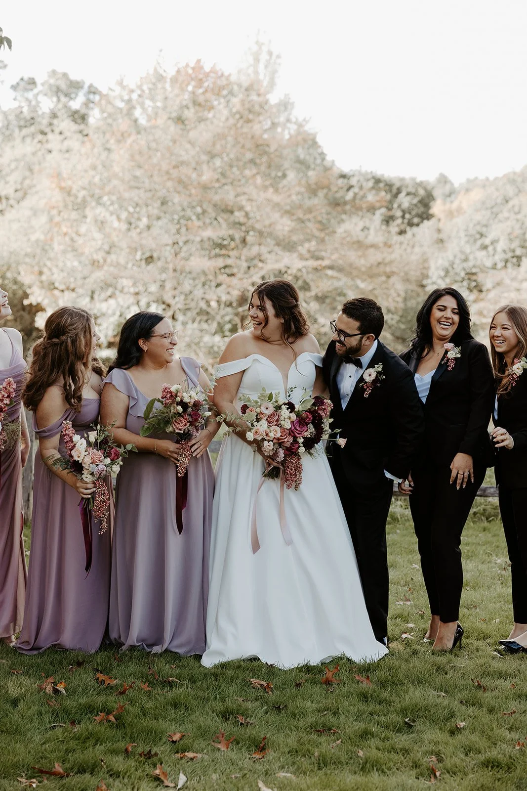 A bride posing for wedding party photos