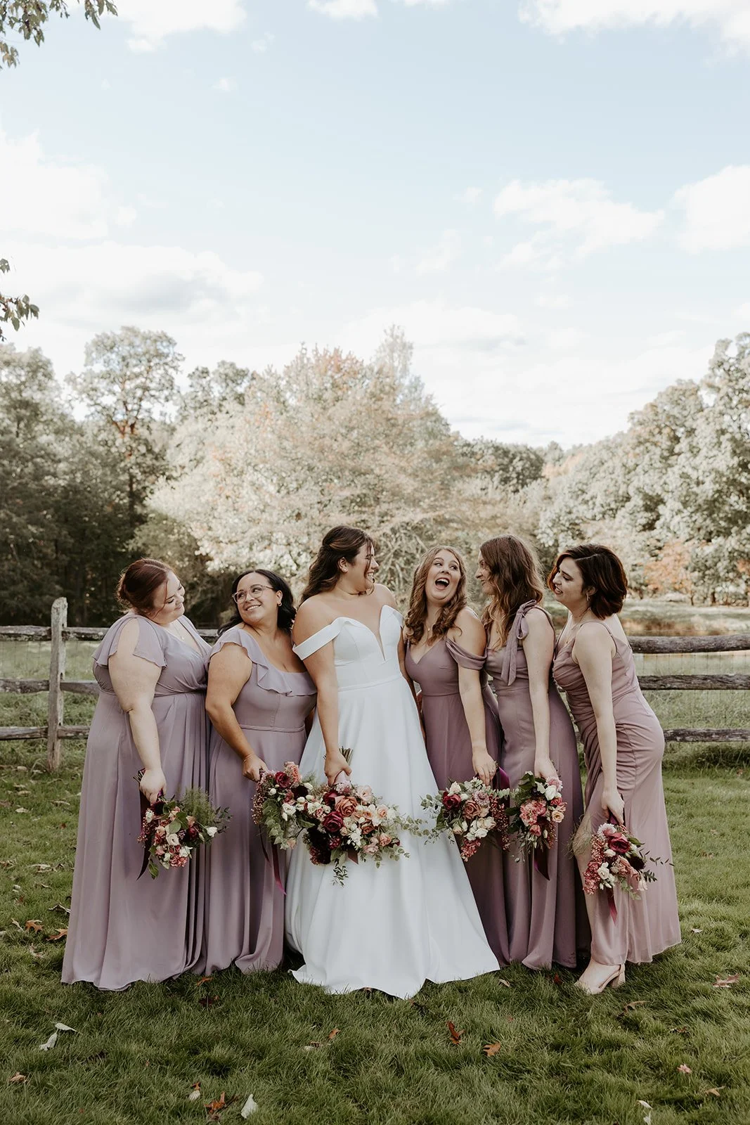 A bride posing for wedding party photos