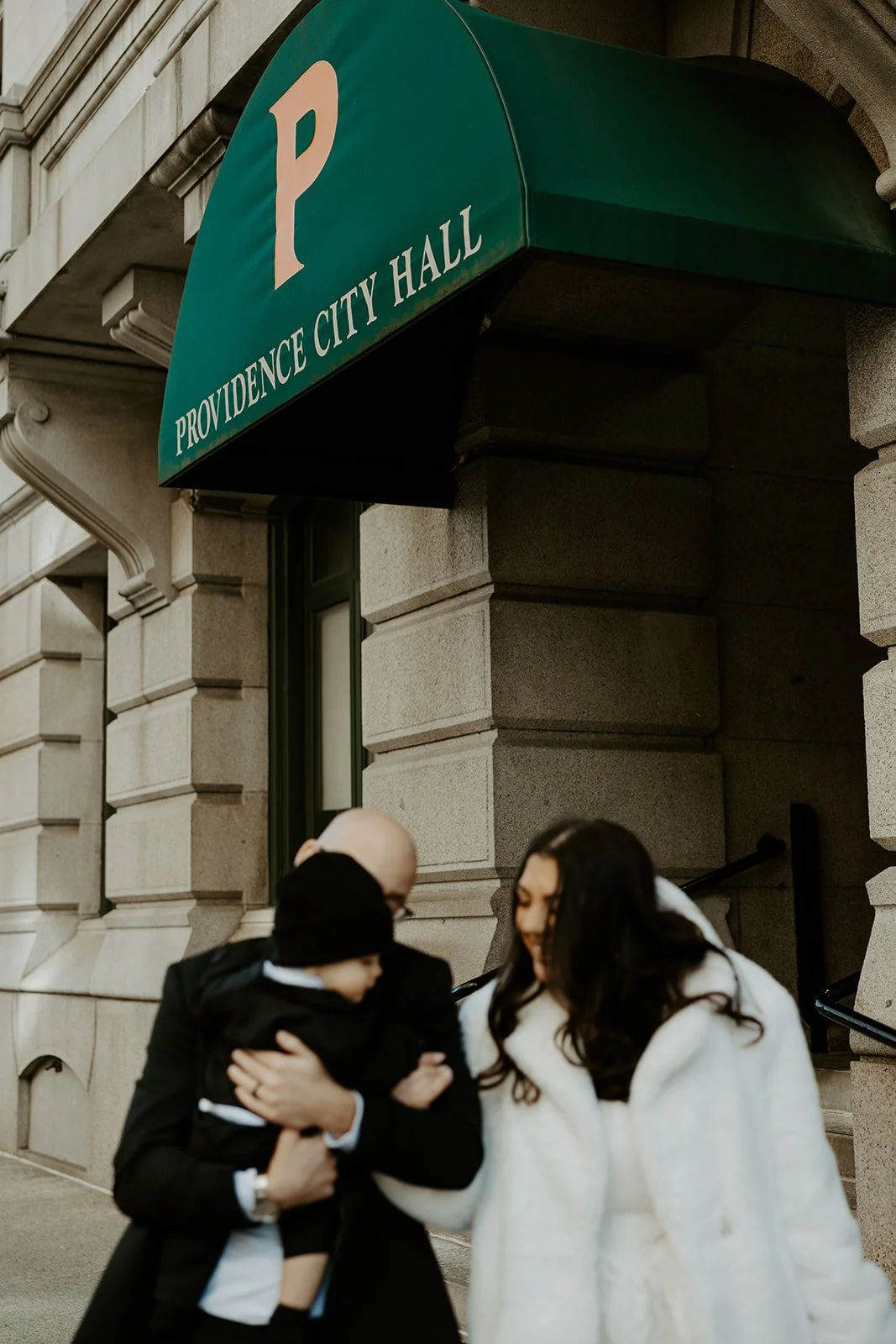 A couple posing for winter elopement photos