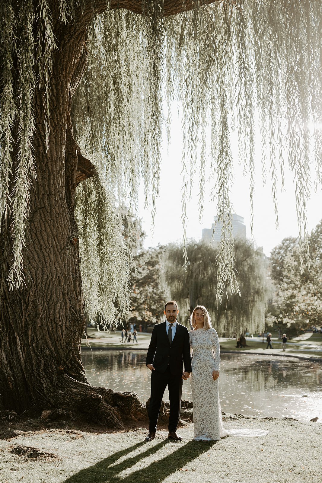 A couple demonstrating how to plan an elopement at boston public garden