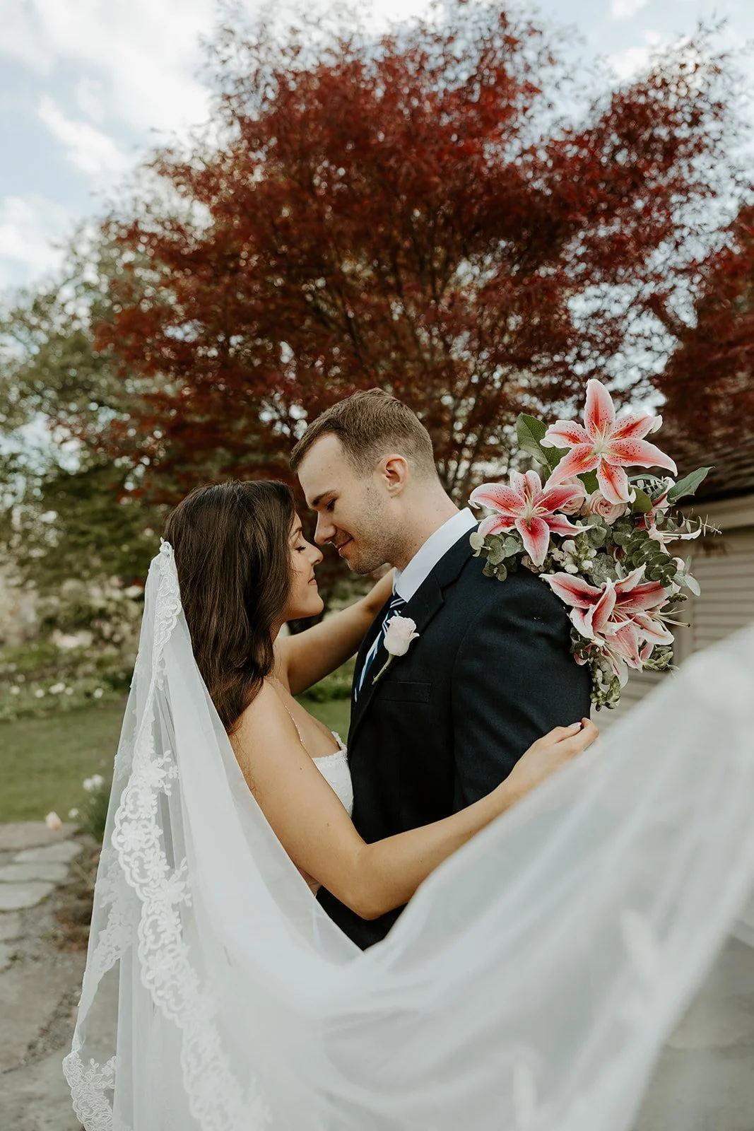 A wedding couple taking photos in a blog about how to plan an elopement