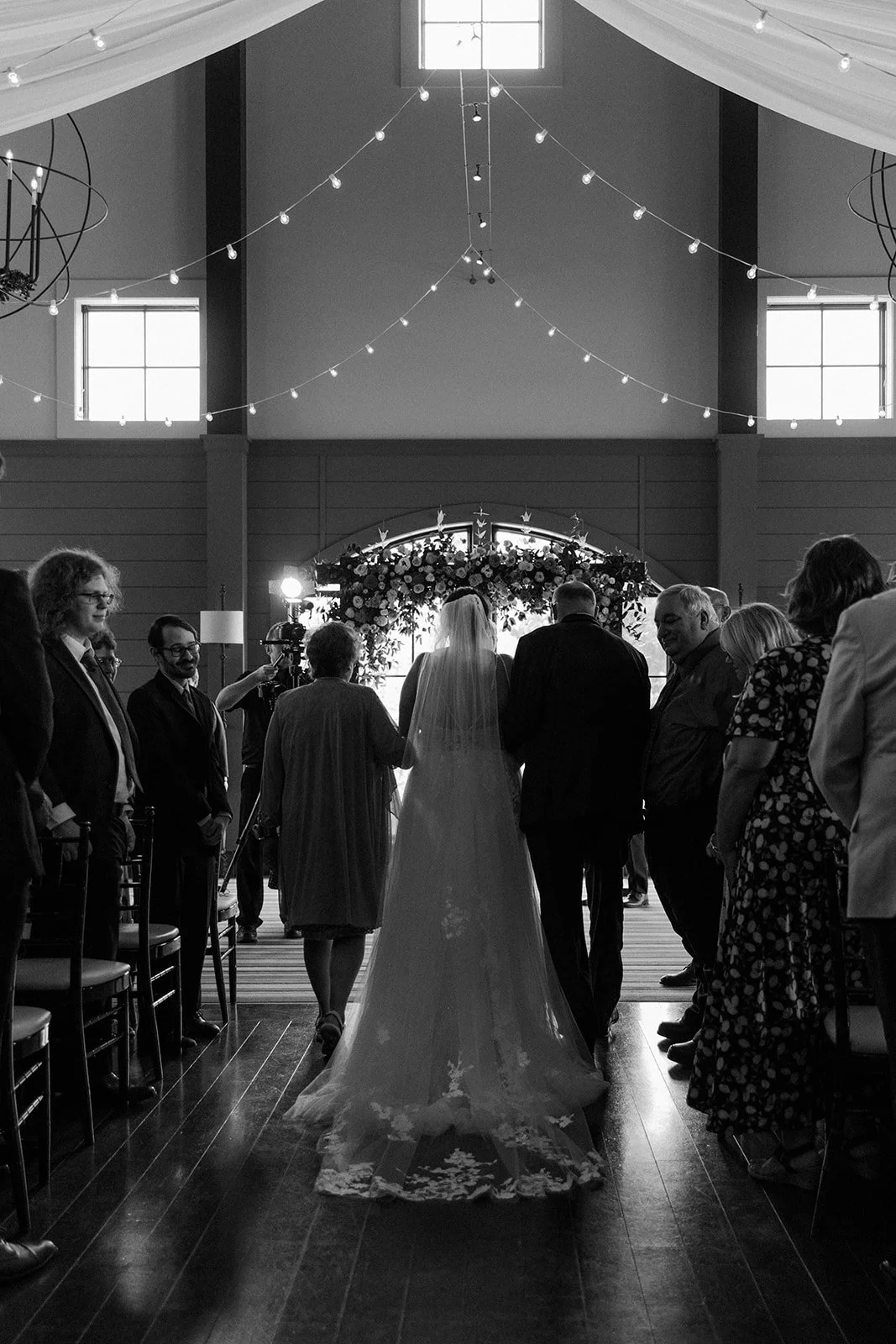 A black and white photo of a wedding ceremony