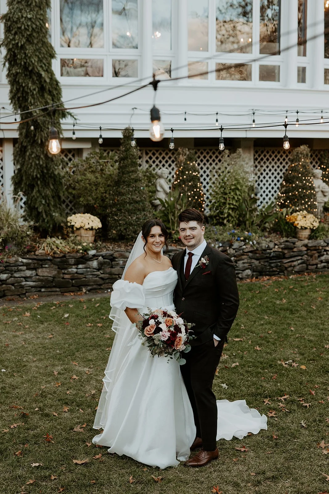 A bride and groom taking wedding photos at bedford village inn