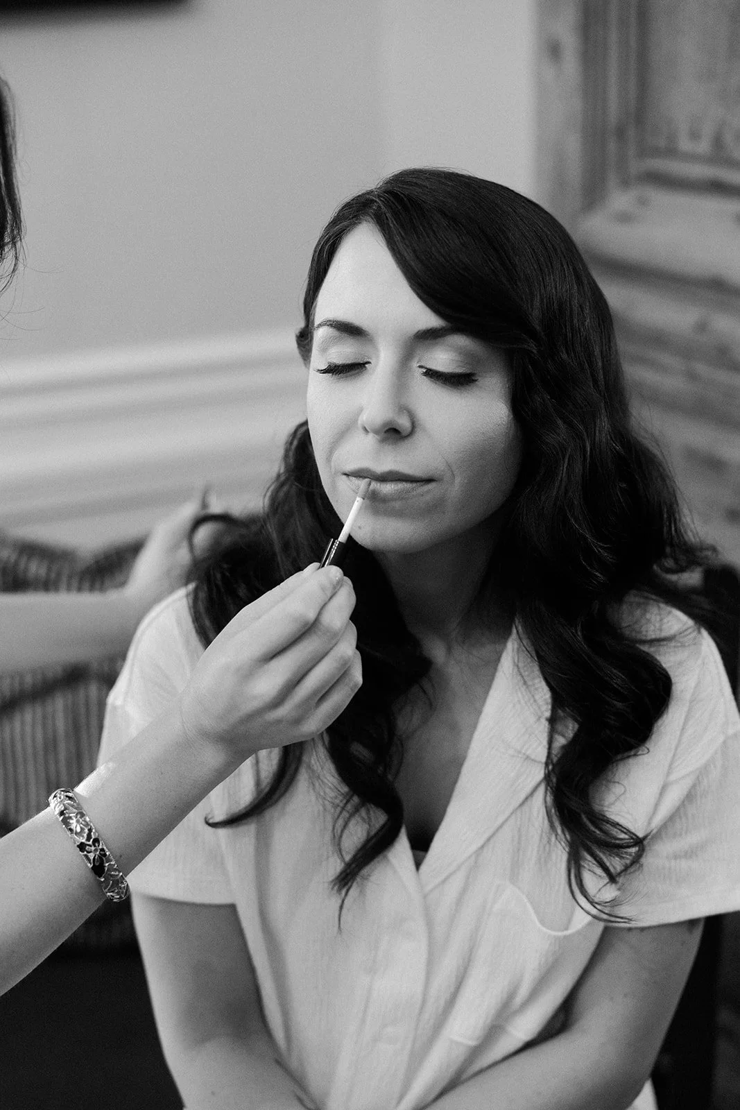 A bride during the getting ready part of her wedding photo list
