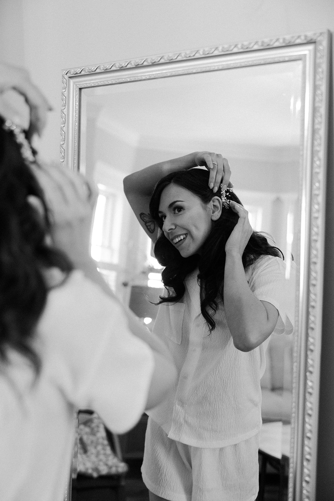 A bride during the getting ready part of her wedding photo list