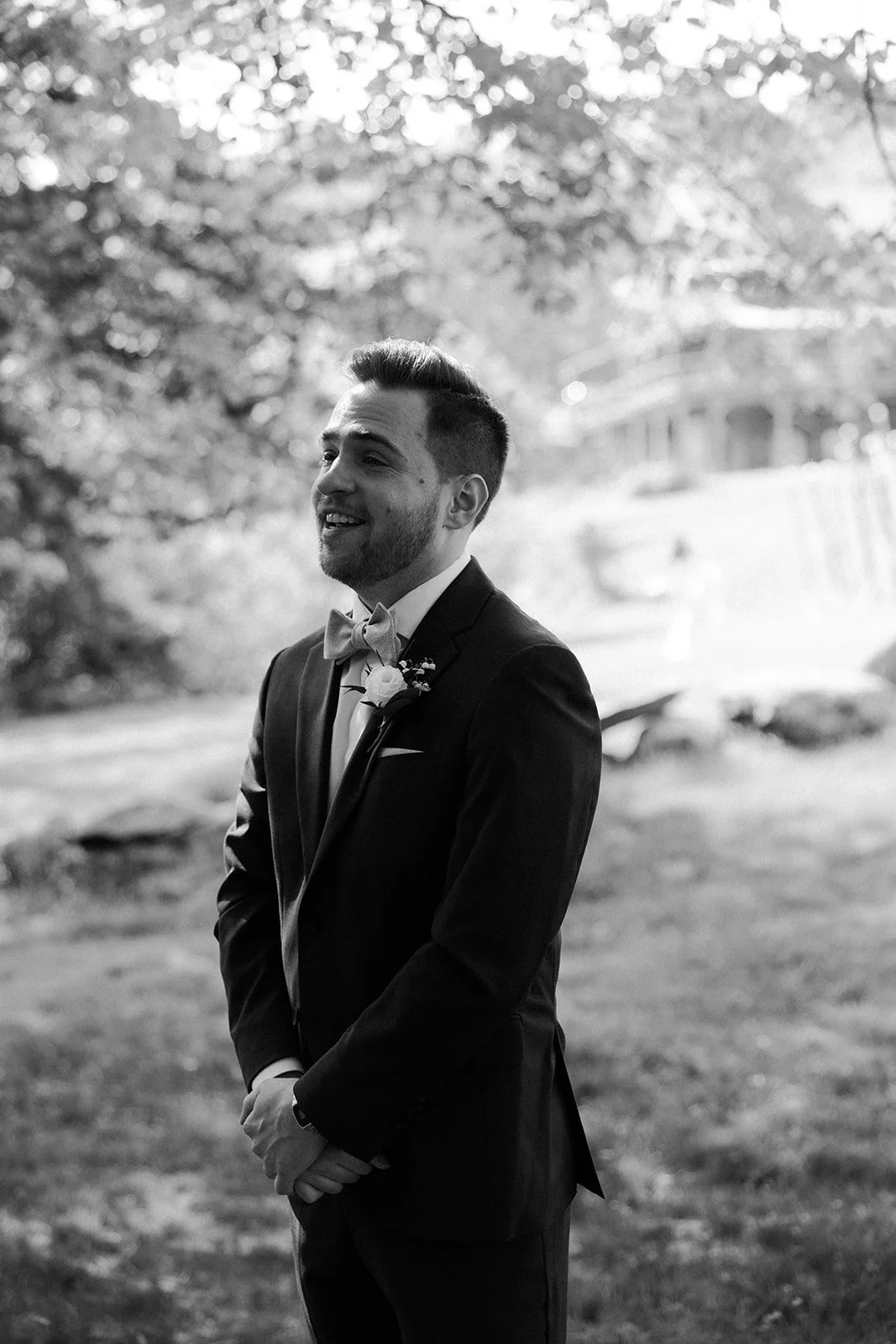 A groom crying before the first look photos on his wedding photo list