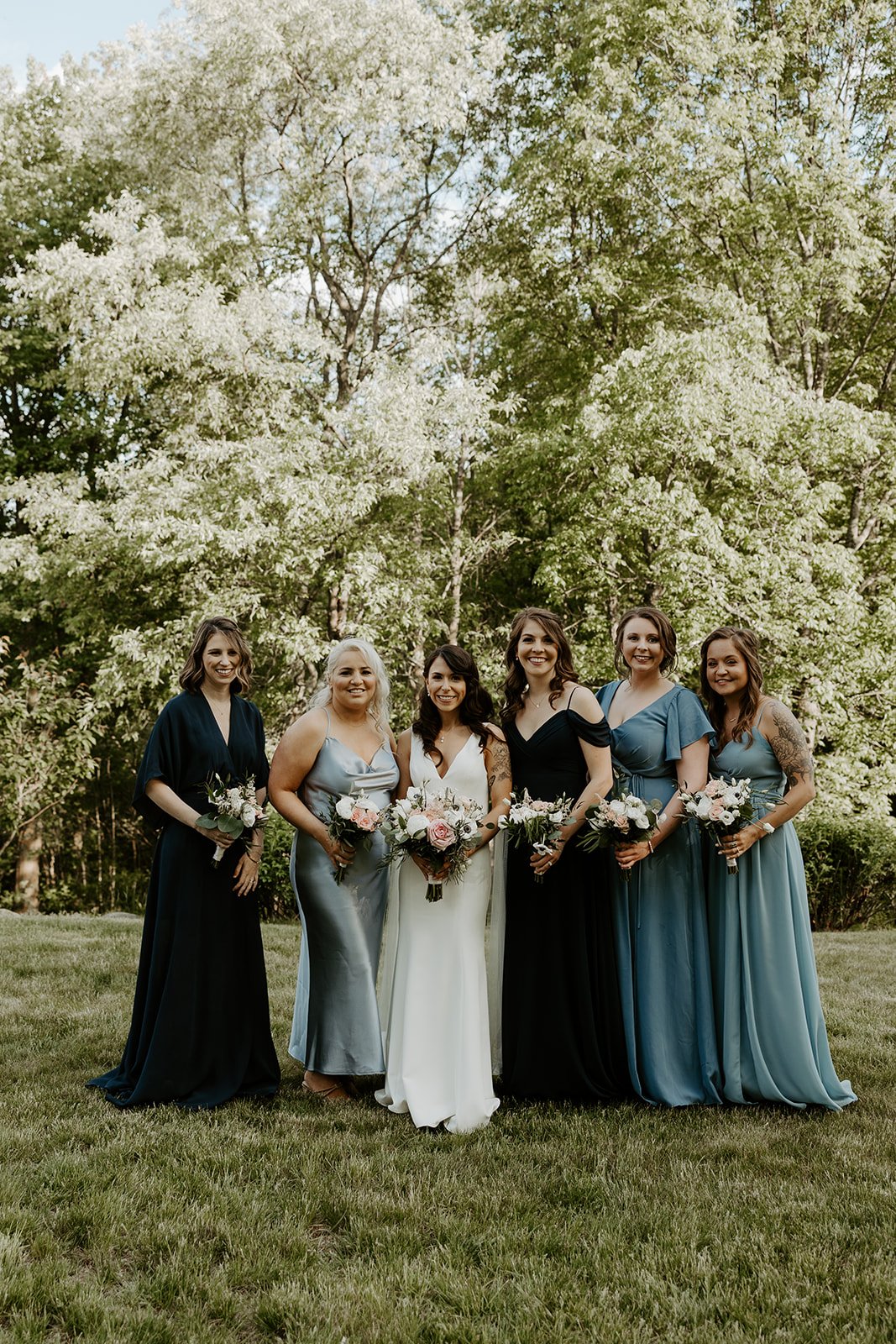 Wedding party photos from a blue wedding