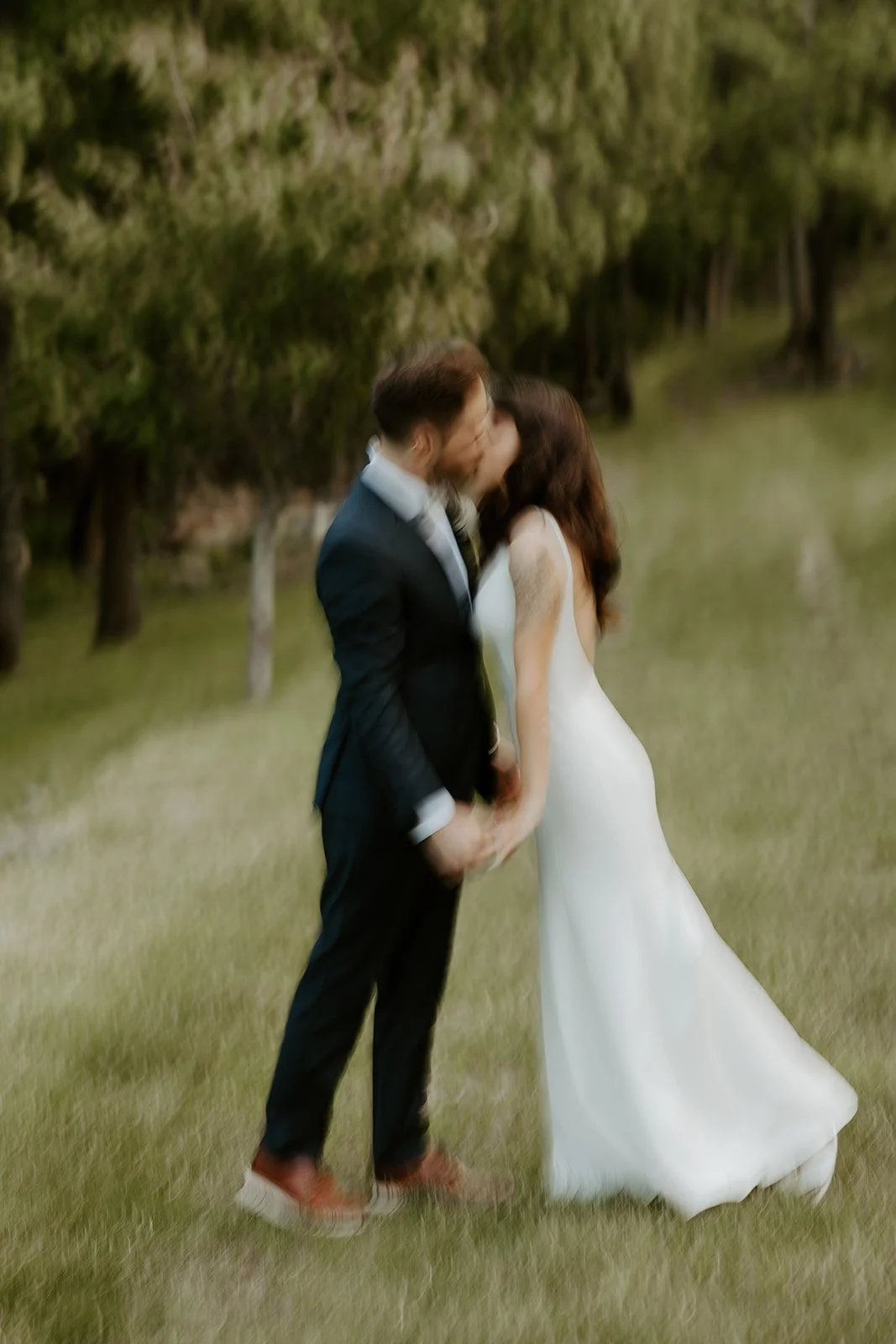 Blurry wedding photos of a bride and groom from a wedding photo list