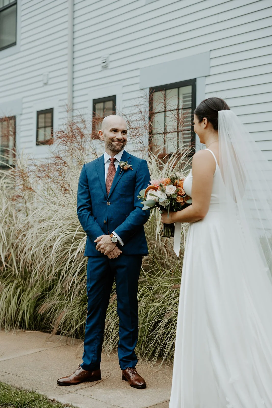 A bride and groom during a first look