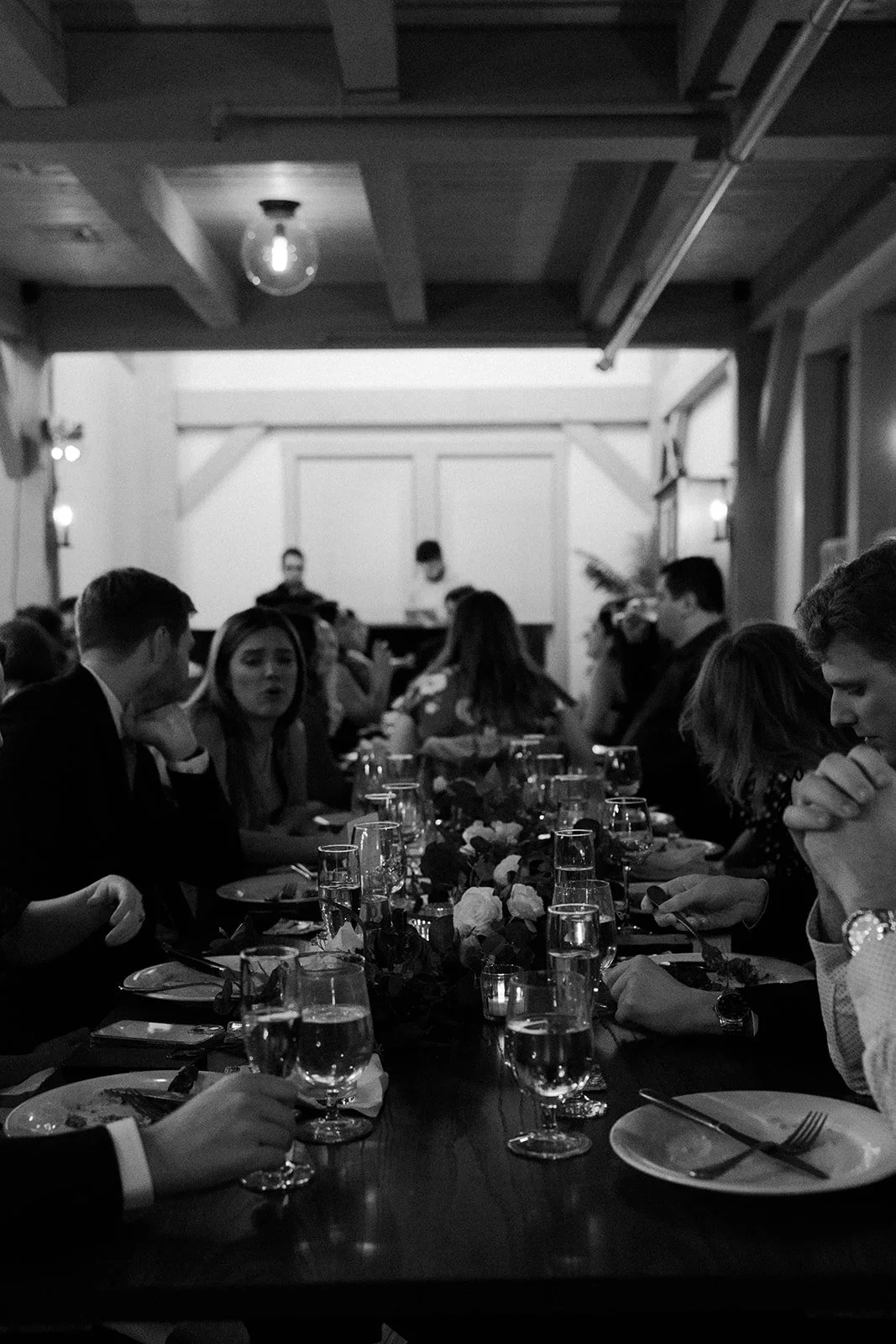 Wedding guests with glasses at a wedding reception