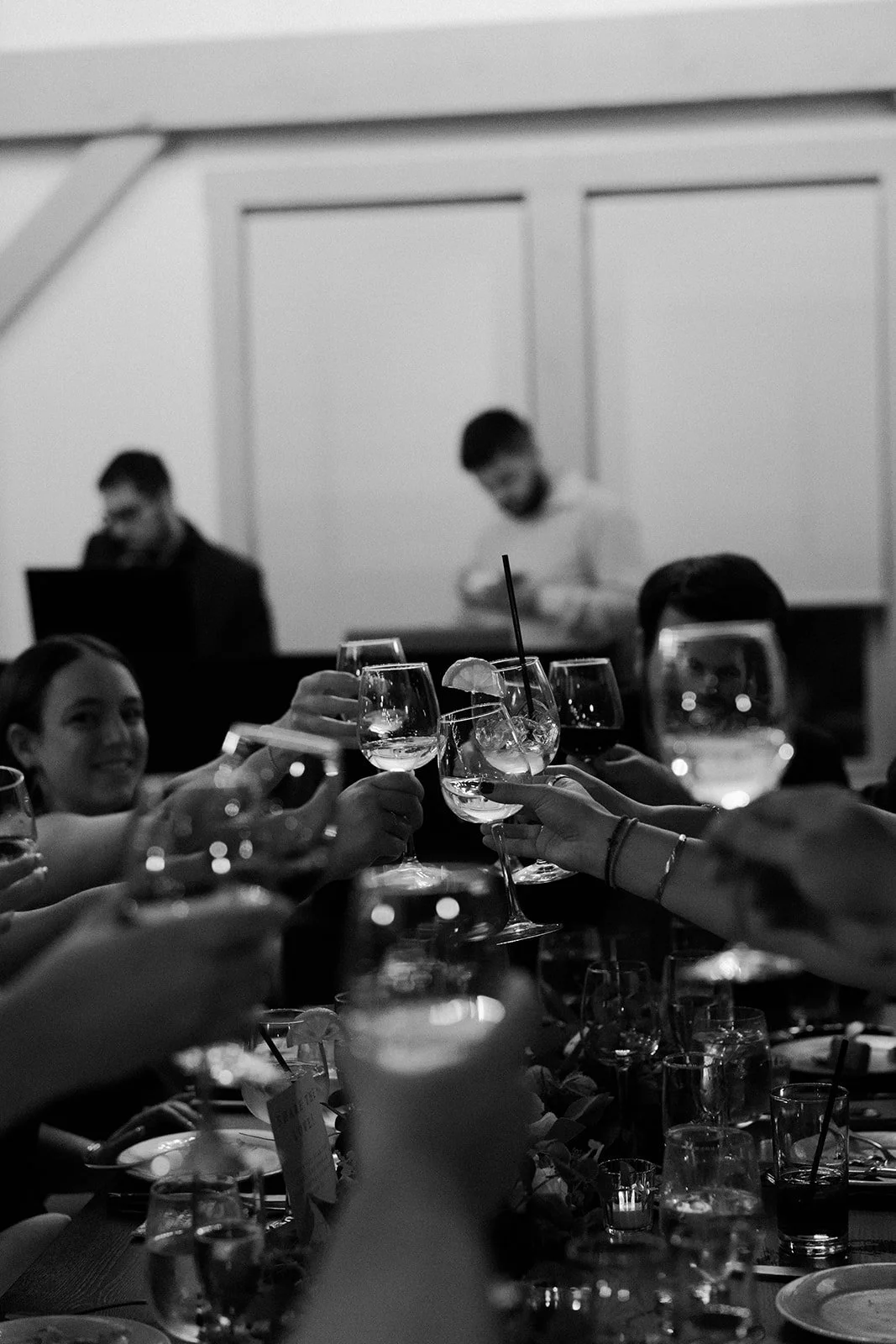 Wedding guests with glasses at a wedding reception