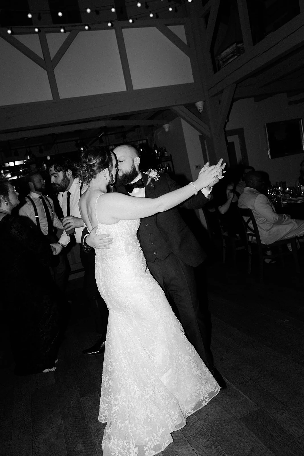 A bride and groom dancing at their wedding reception