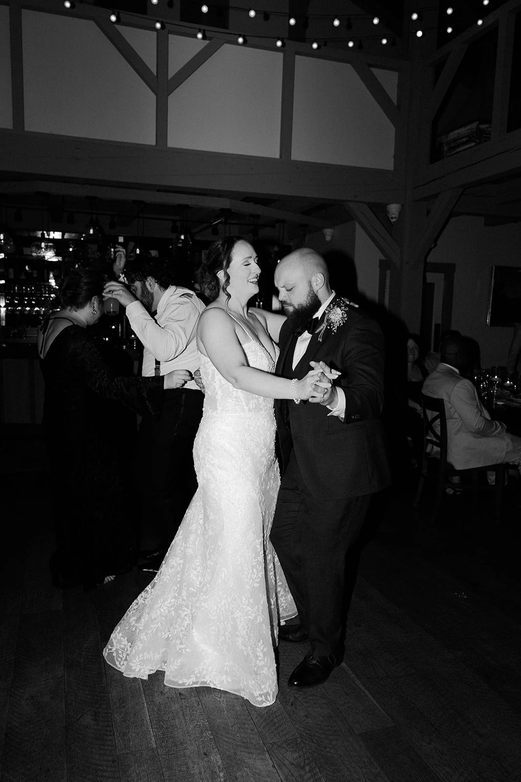 A bride and groom dancing at their wedding reception