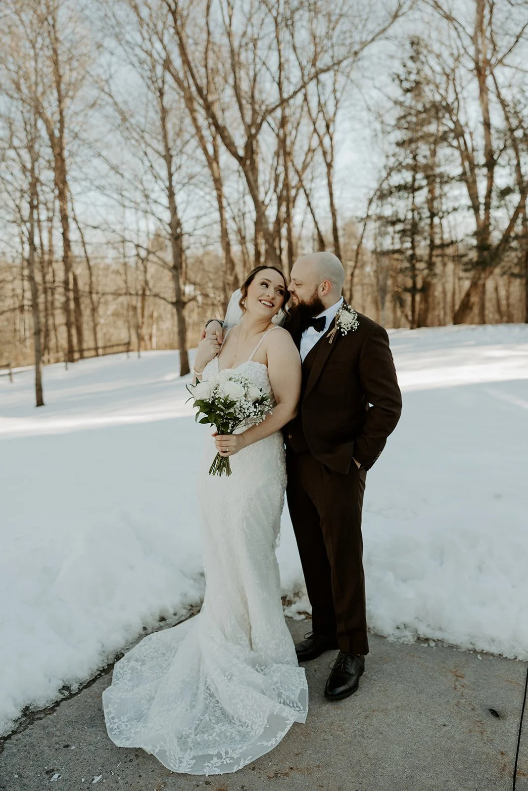 A bride and groom in their winter wedding at the grove rowley ma