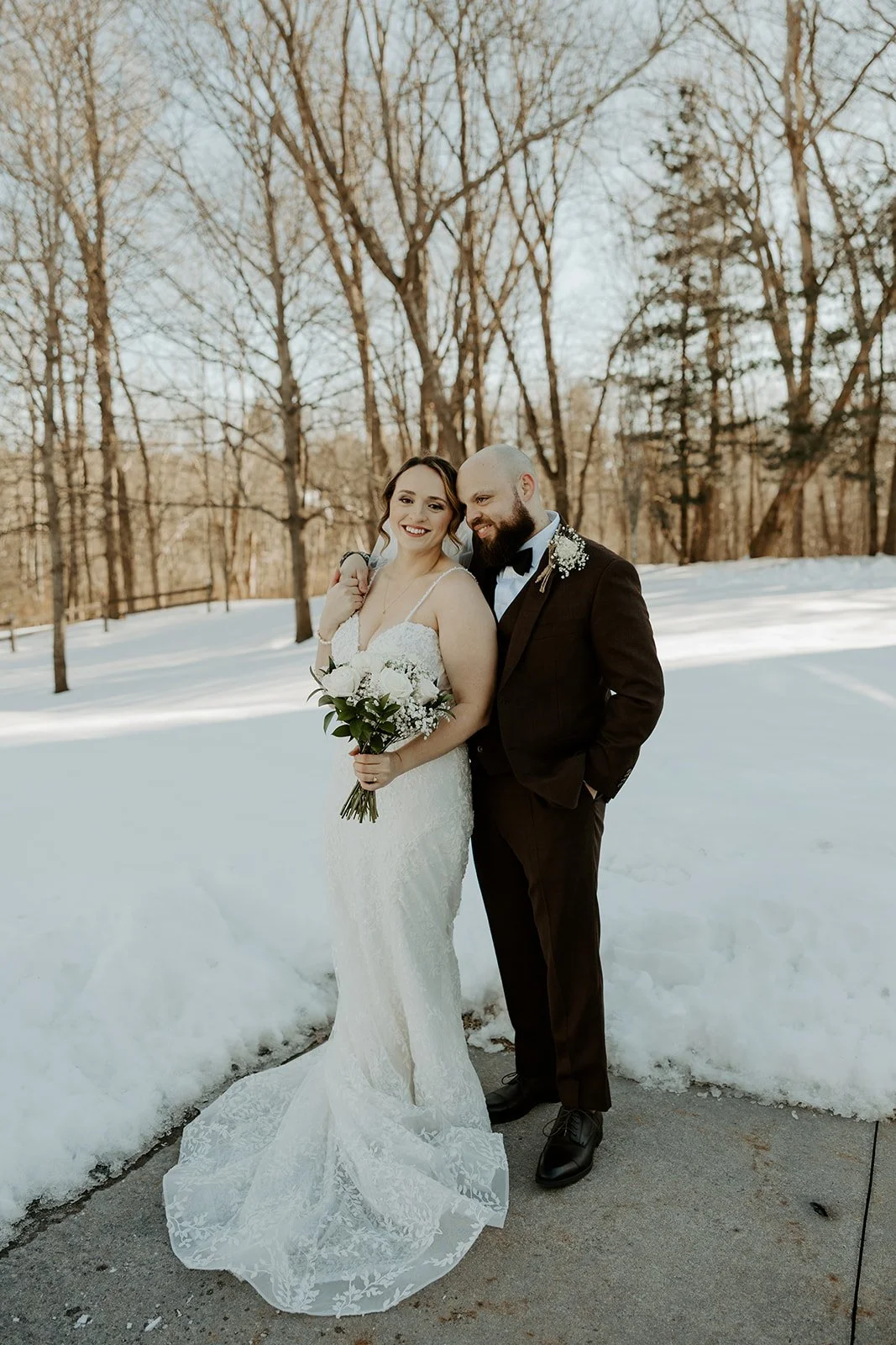 A bride and groom in their winter wedding at the grove rowley ma