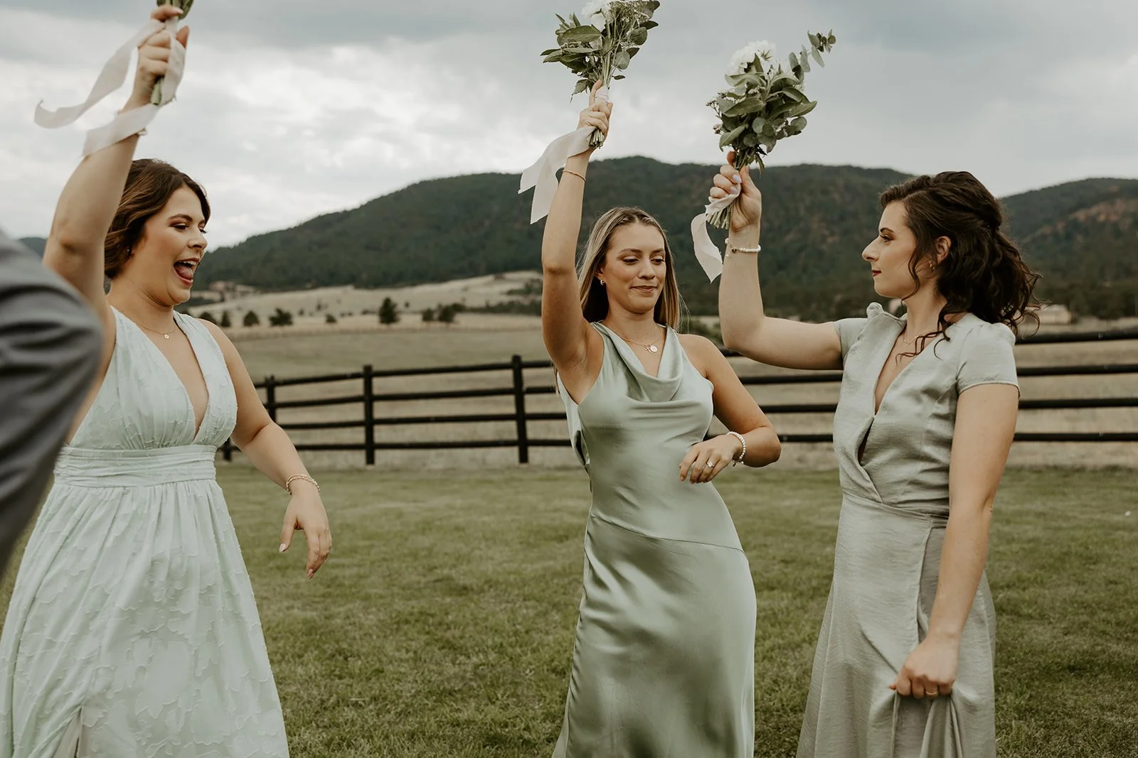A bridal party cheering after a destination wedding ceremony