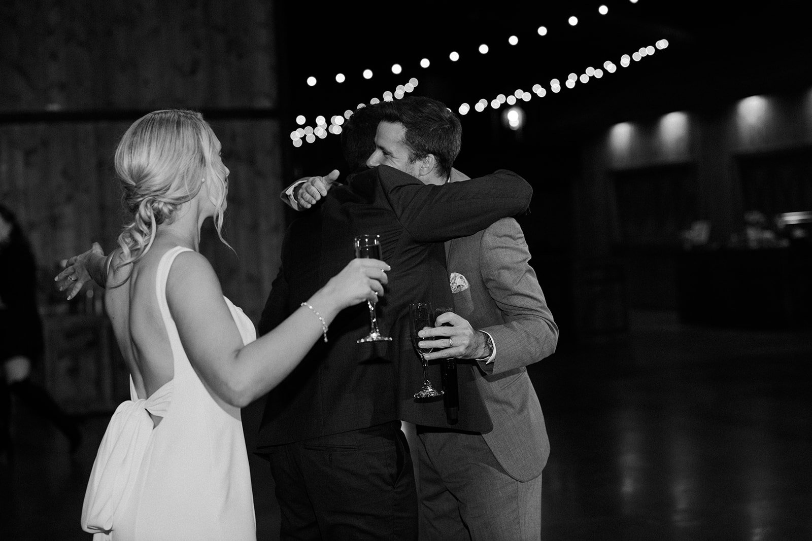 A bride and groom dancing at their wedding reception