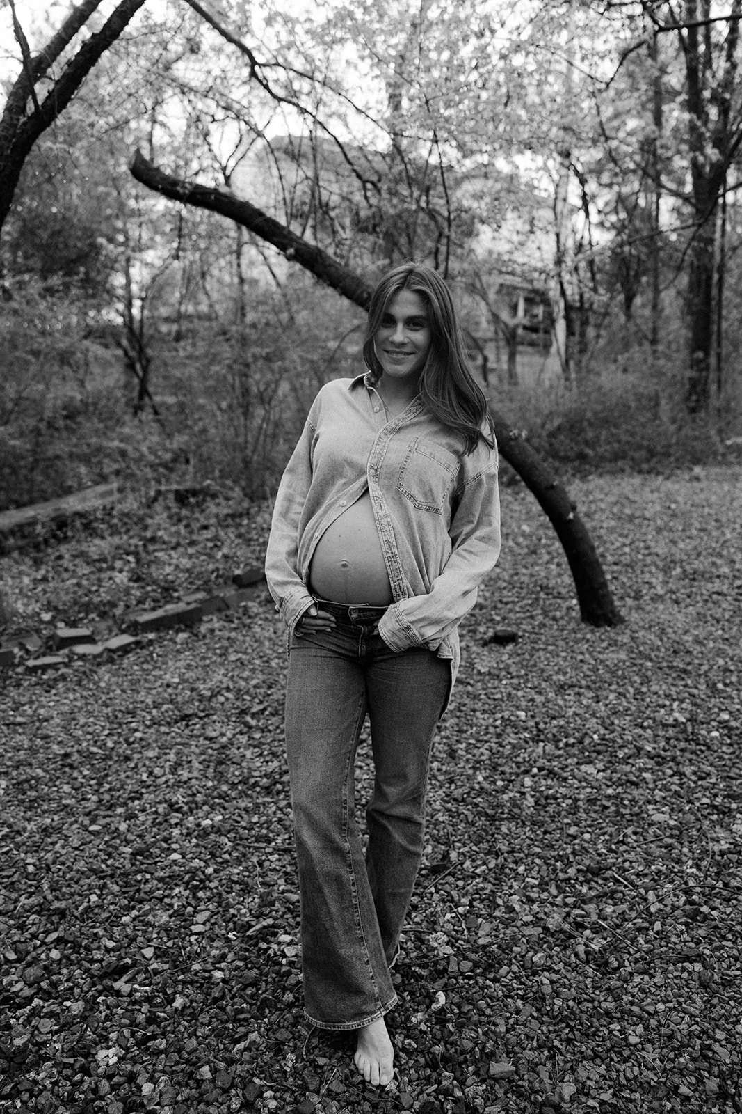 A black and white photo from a maternity photoshoot