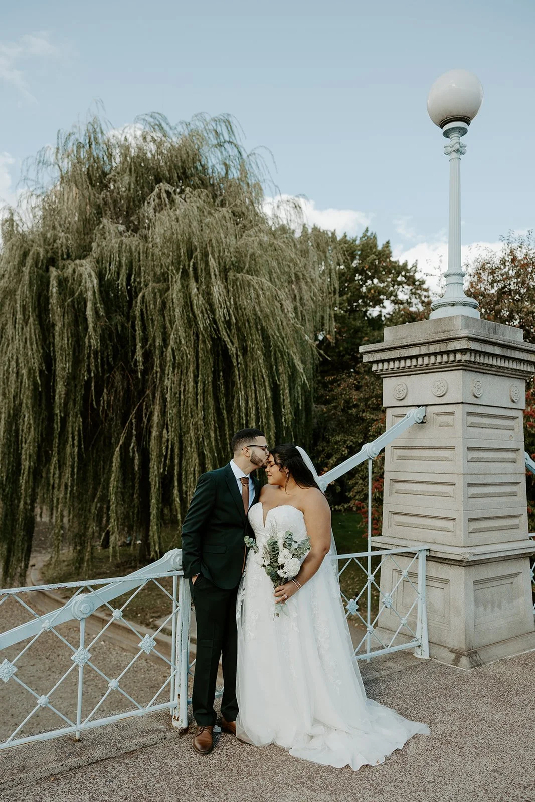 Wedding photos on the bridge in Boston Public Garden