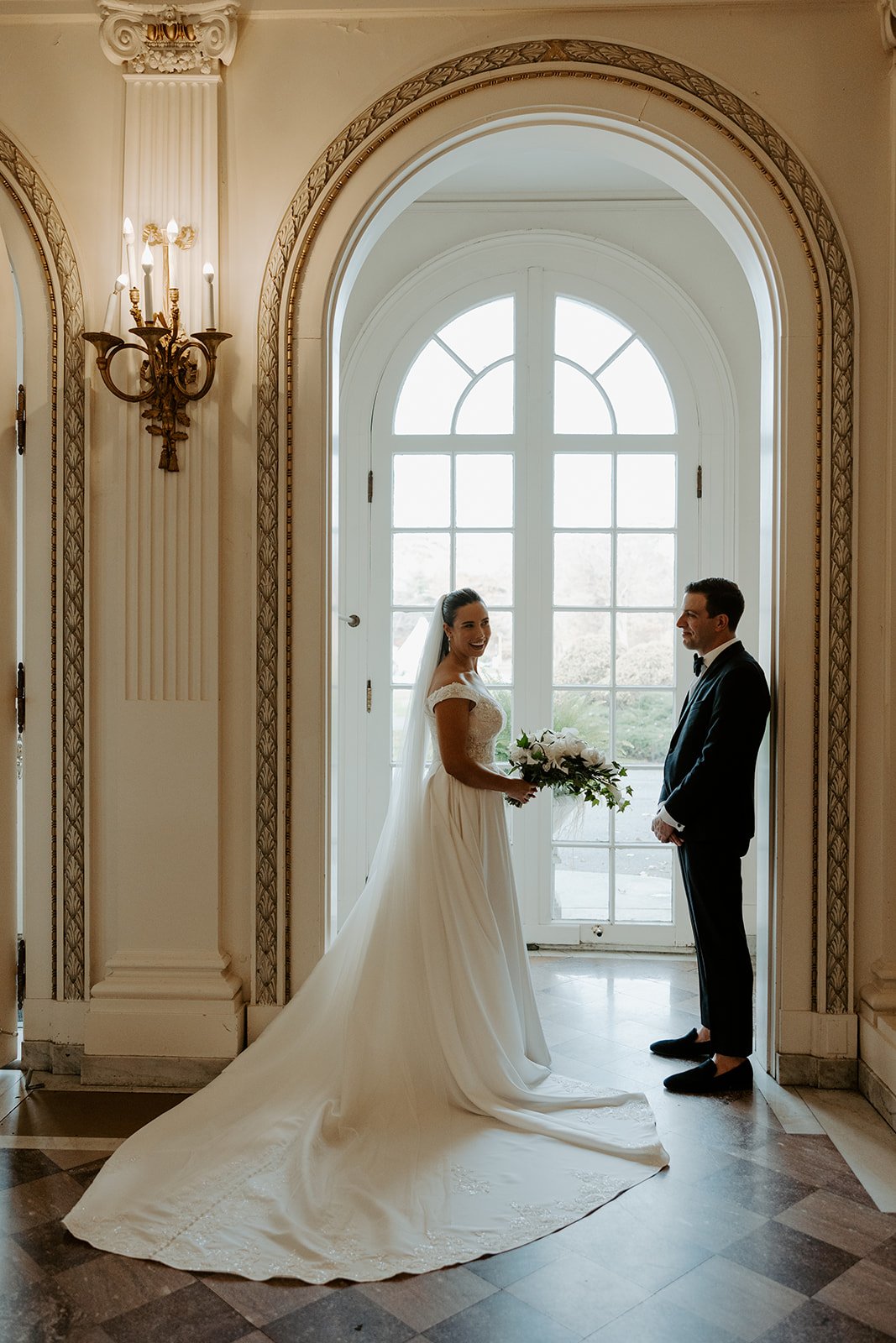 A bride and groom in an estate as their wedding setting