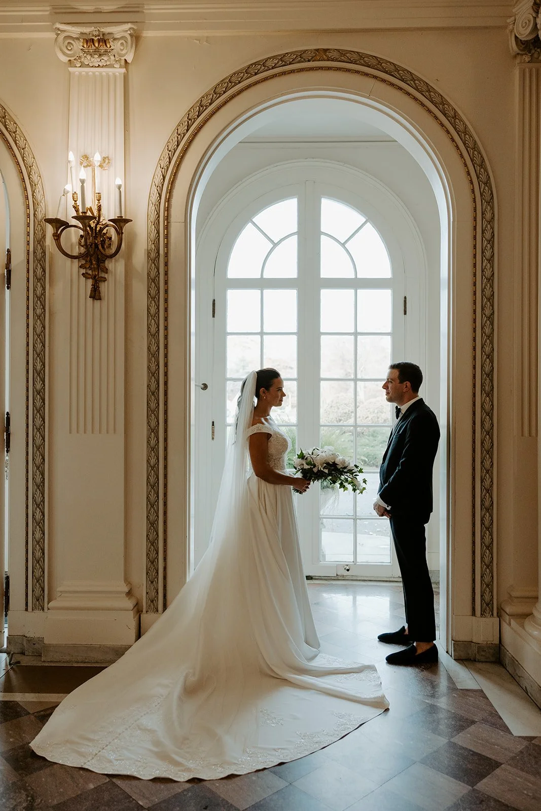 A bride and groom in an estate as their wedding setting