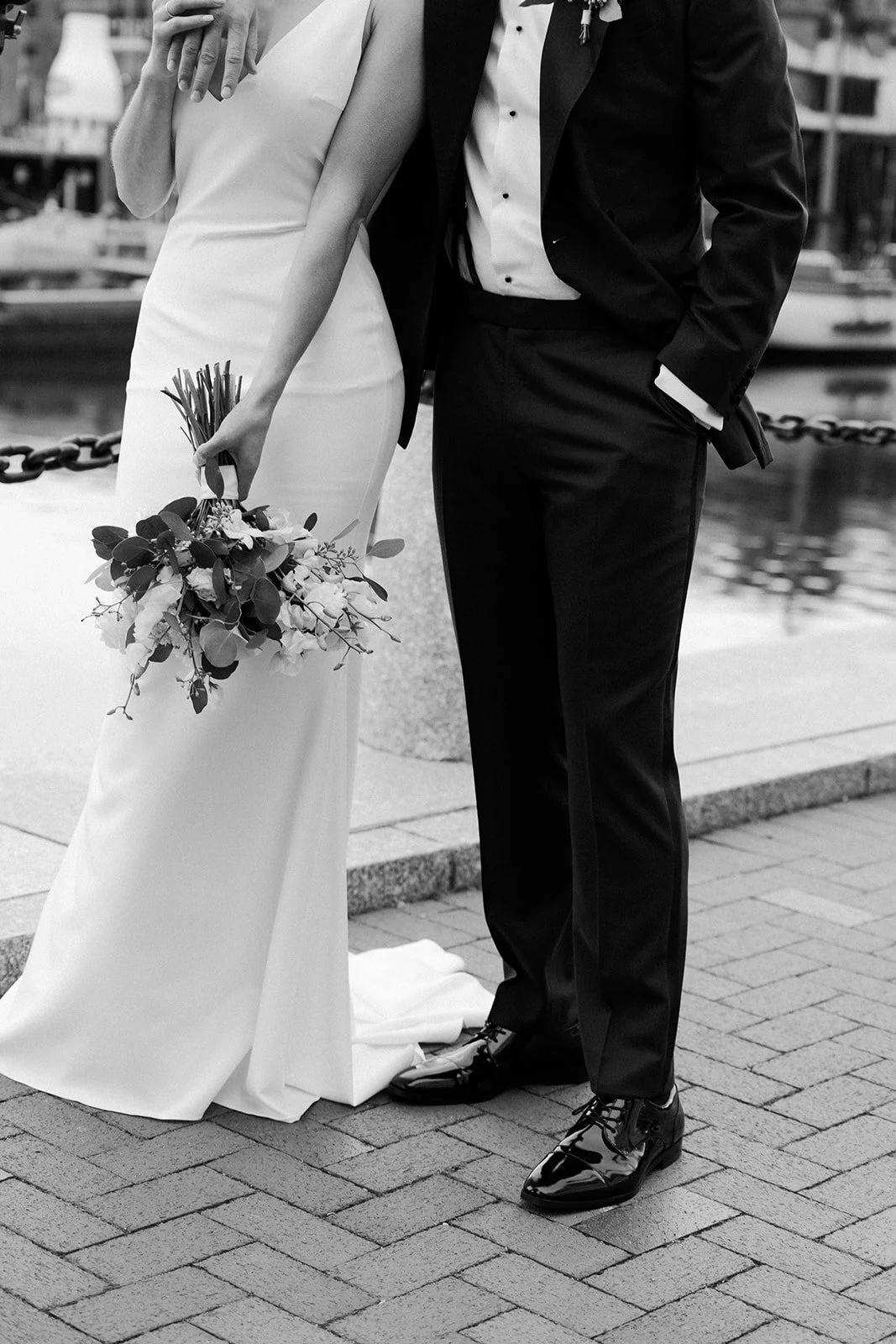 A bride and groom in a city wedding setting for portraits