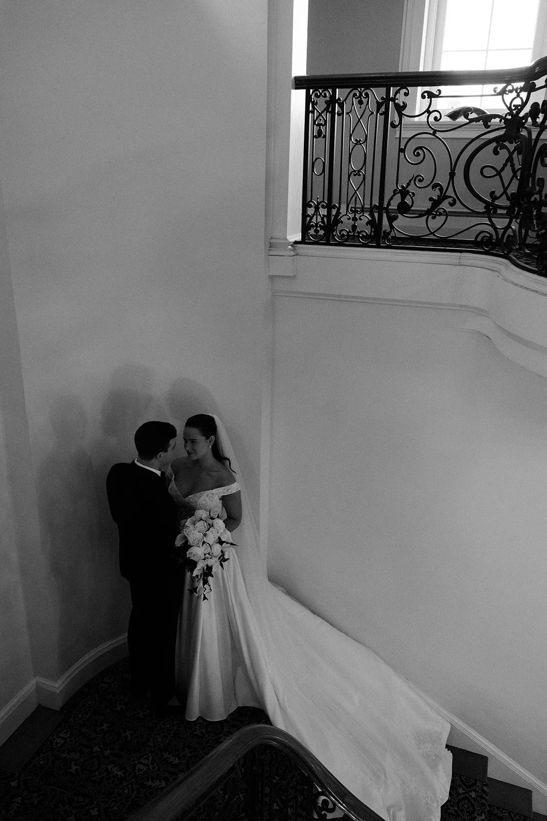 A bride and groom in an estate wedding setting