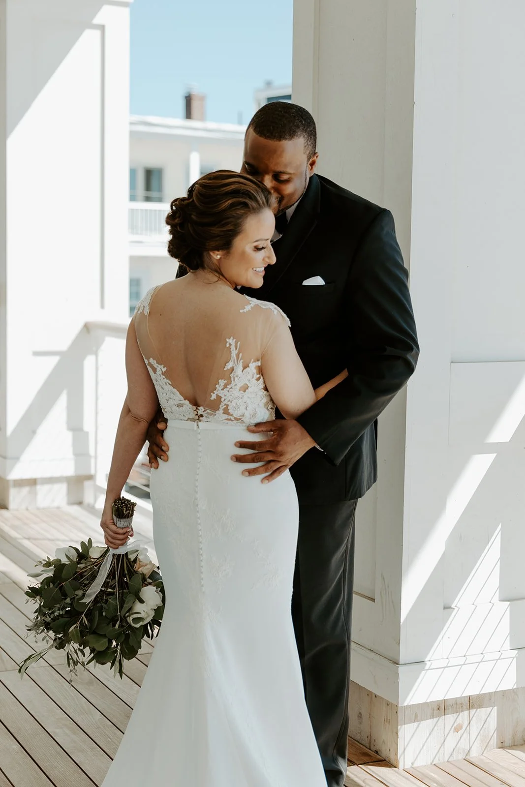 A bride and groom taking wedding photos at Beauport Hotel