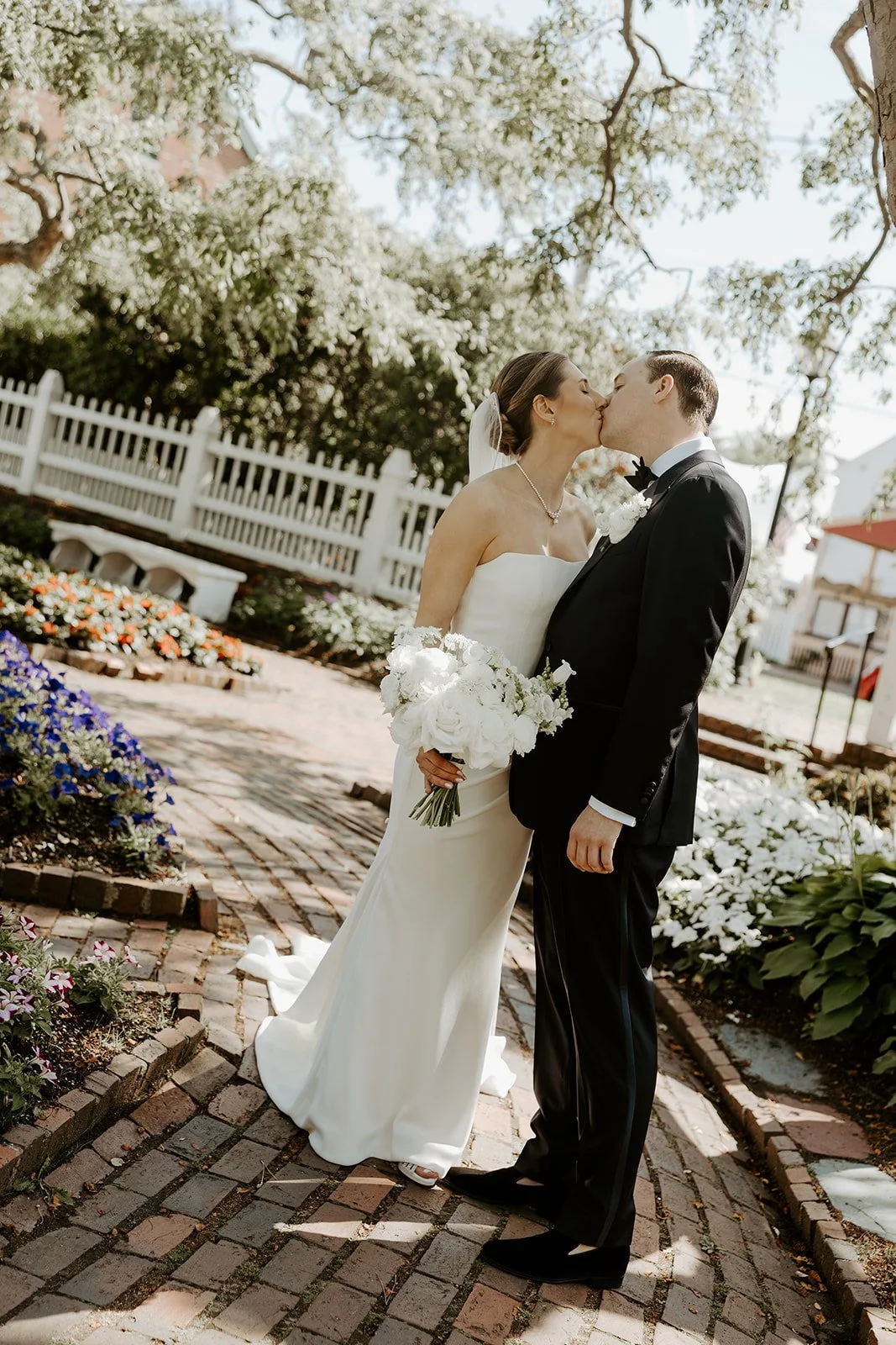 A bride and groom posing for portraits