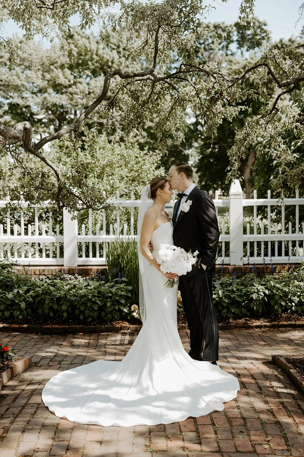 A bride and groom posing for portraits