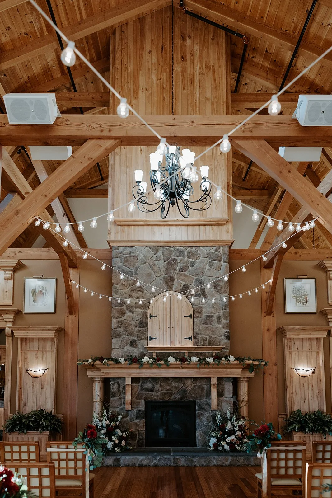 A wedding ceremony inside of the Red Barn at Outlook Farm
