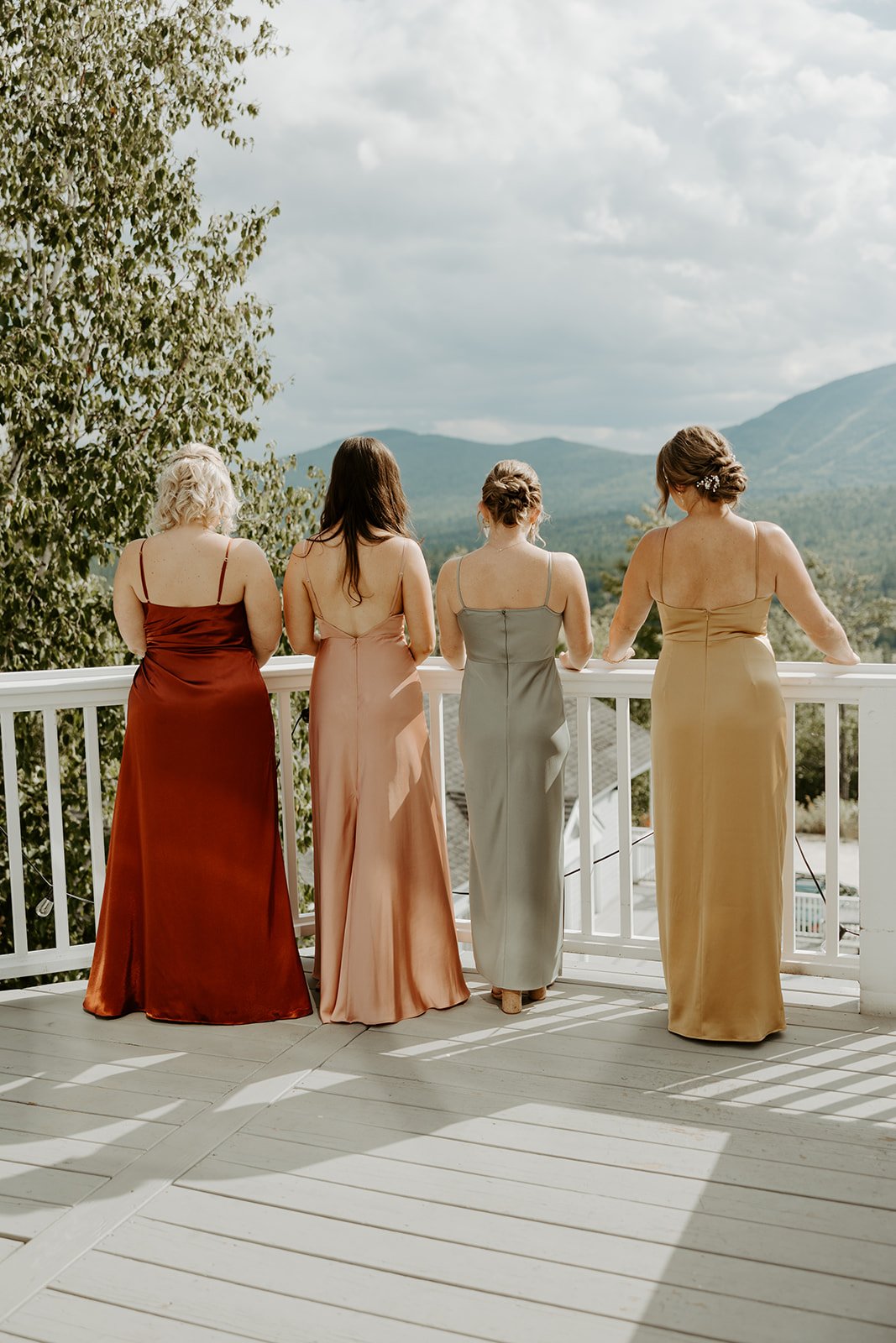 A bride doing a first look with  her bridesmaids