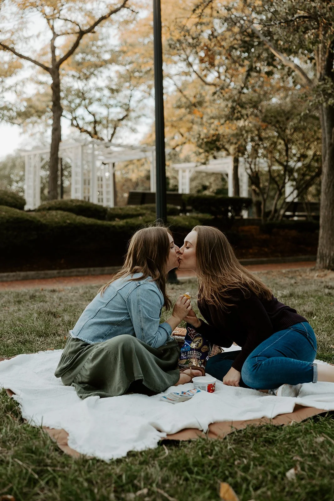 A couple playing phase 10 for date-night engagement photos