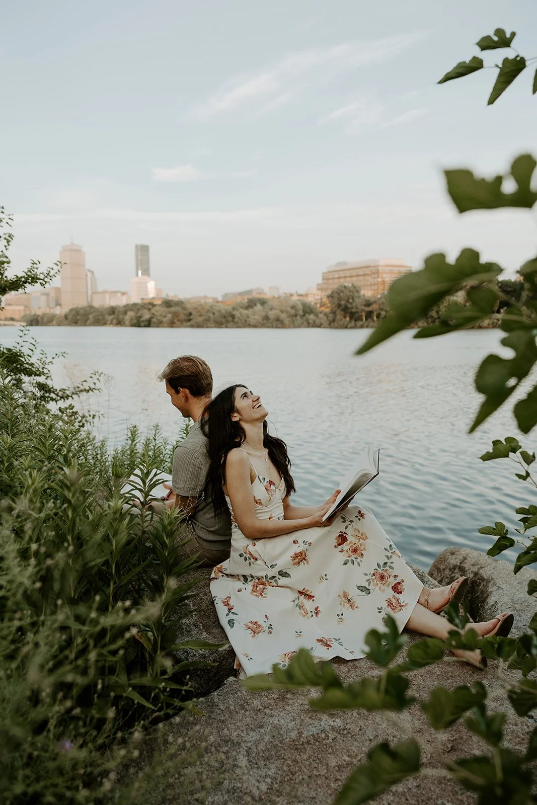 A couple reading for their date night engagement photos