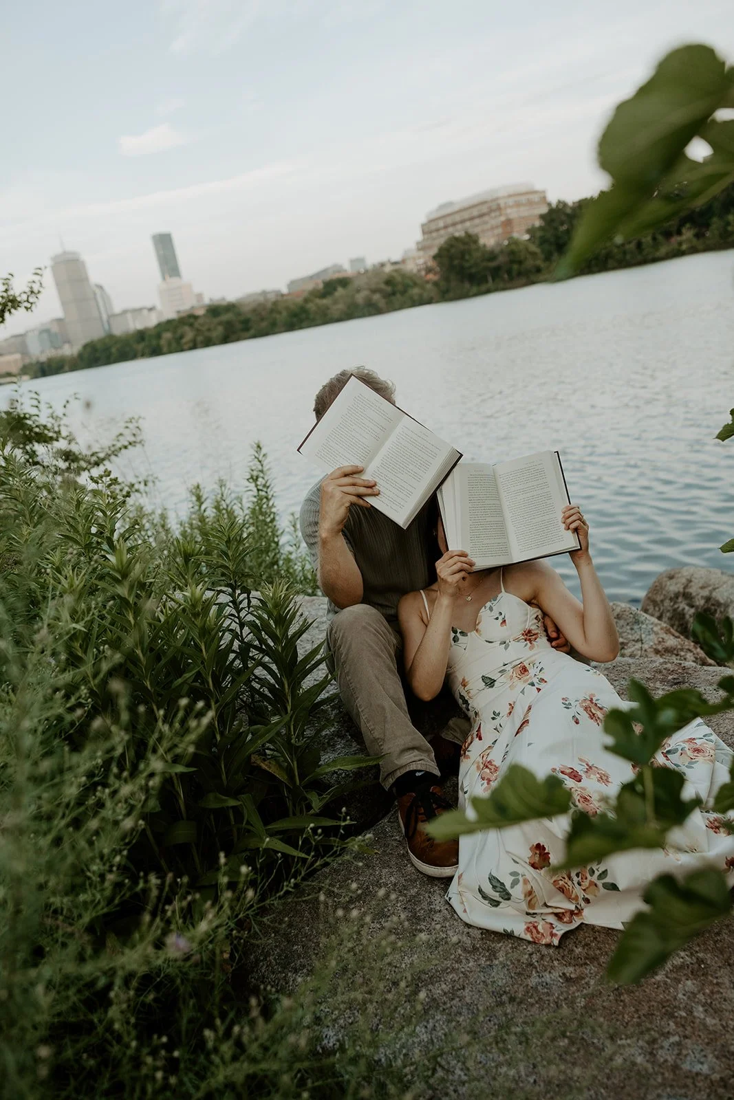 A couple reading for their date night engagement photos