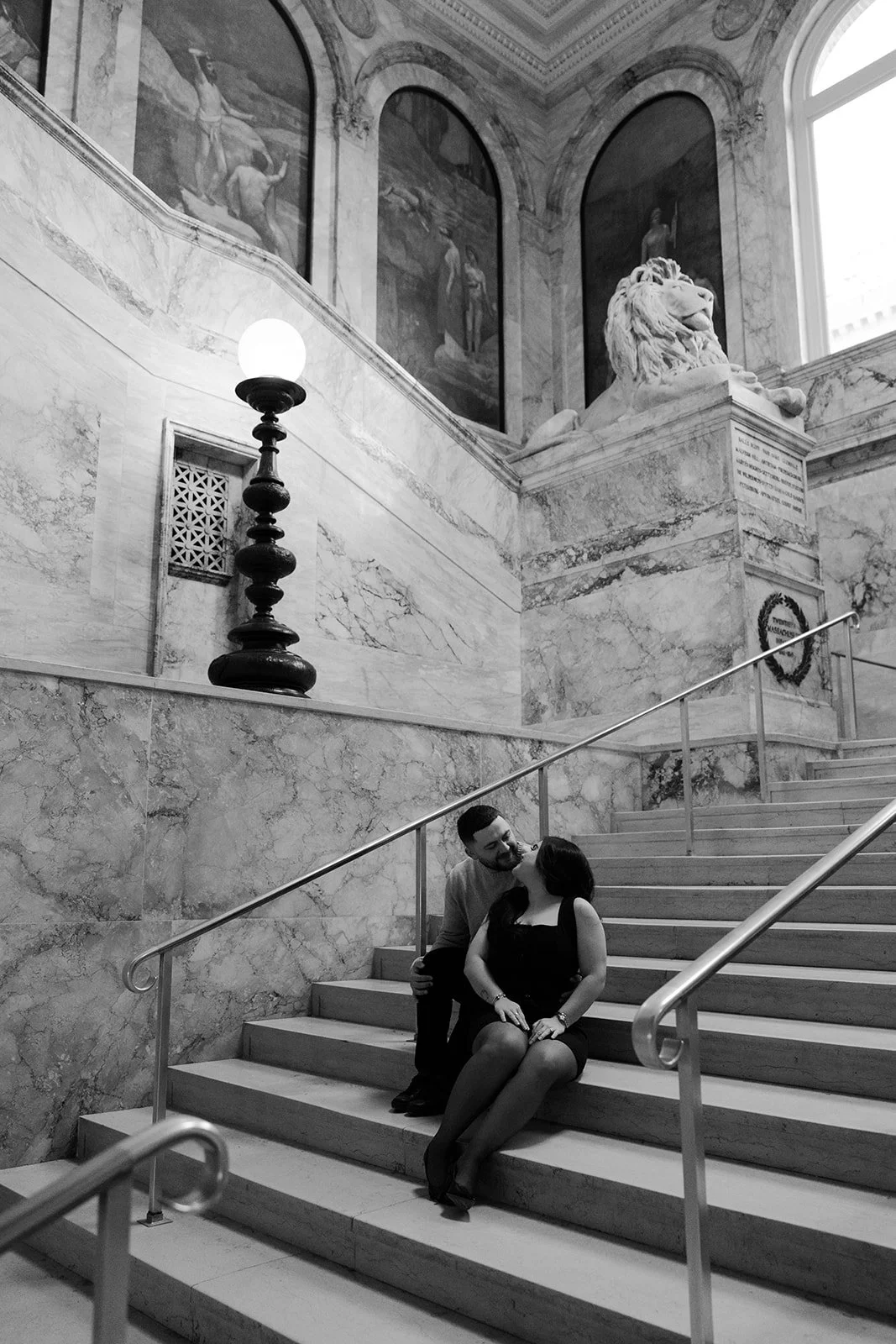 A couple taking date night engagement photos