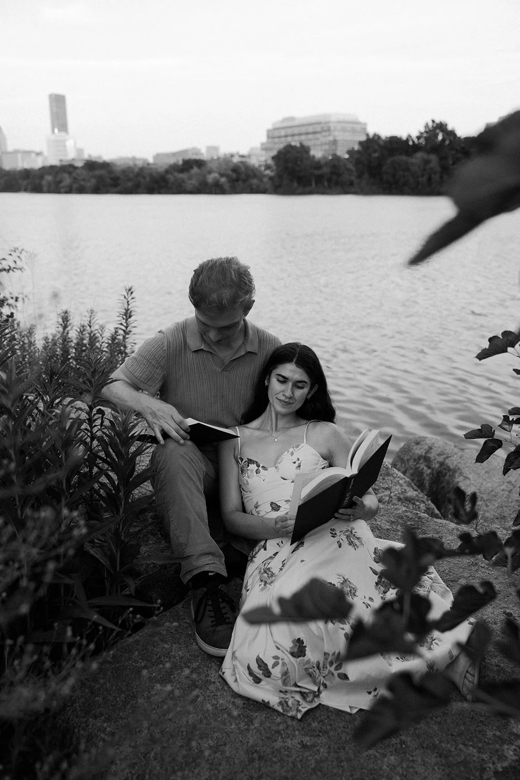 A couple reading during engagement photos