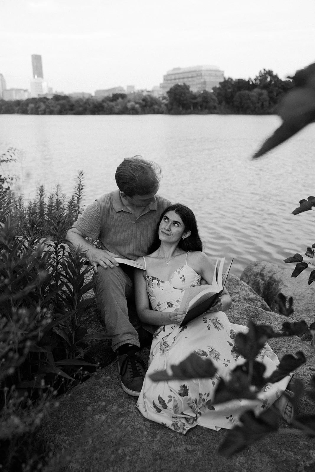 A couple reading during engagement photos