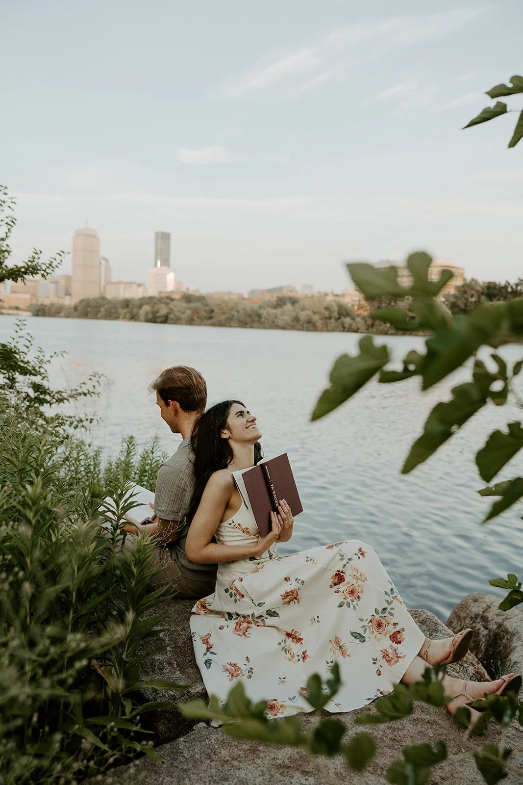 A couple reading during engagement photos
