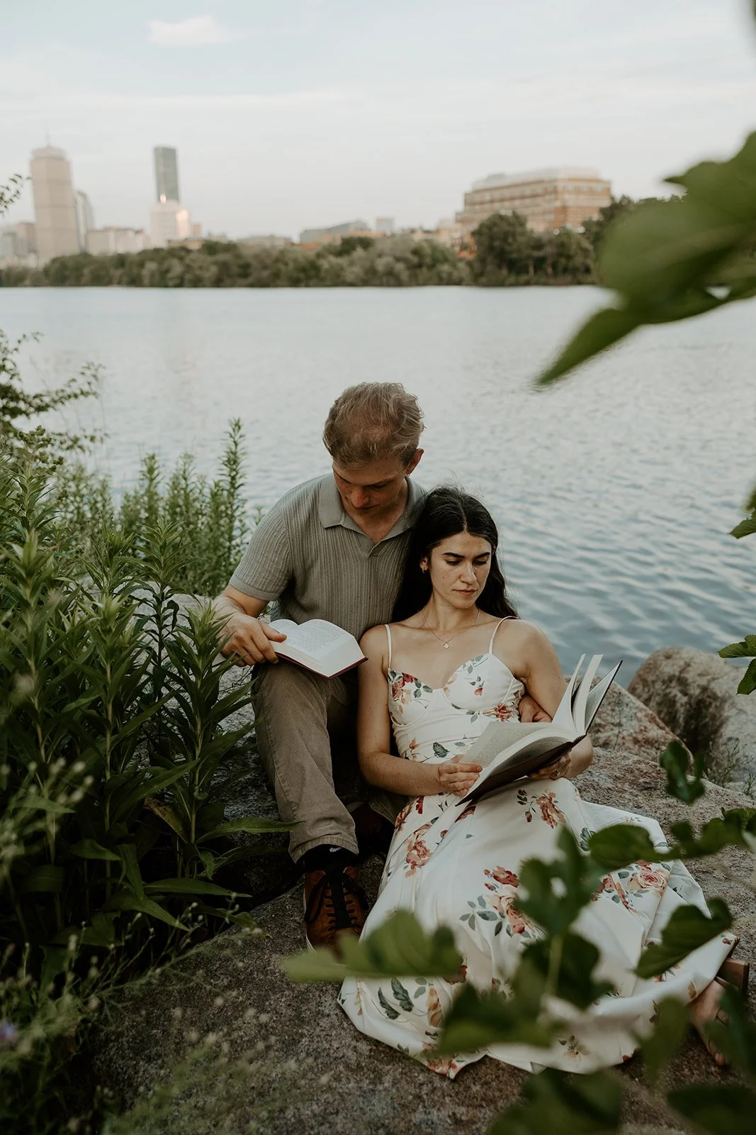 A couple reading during engagement photos