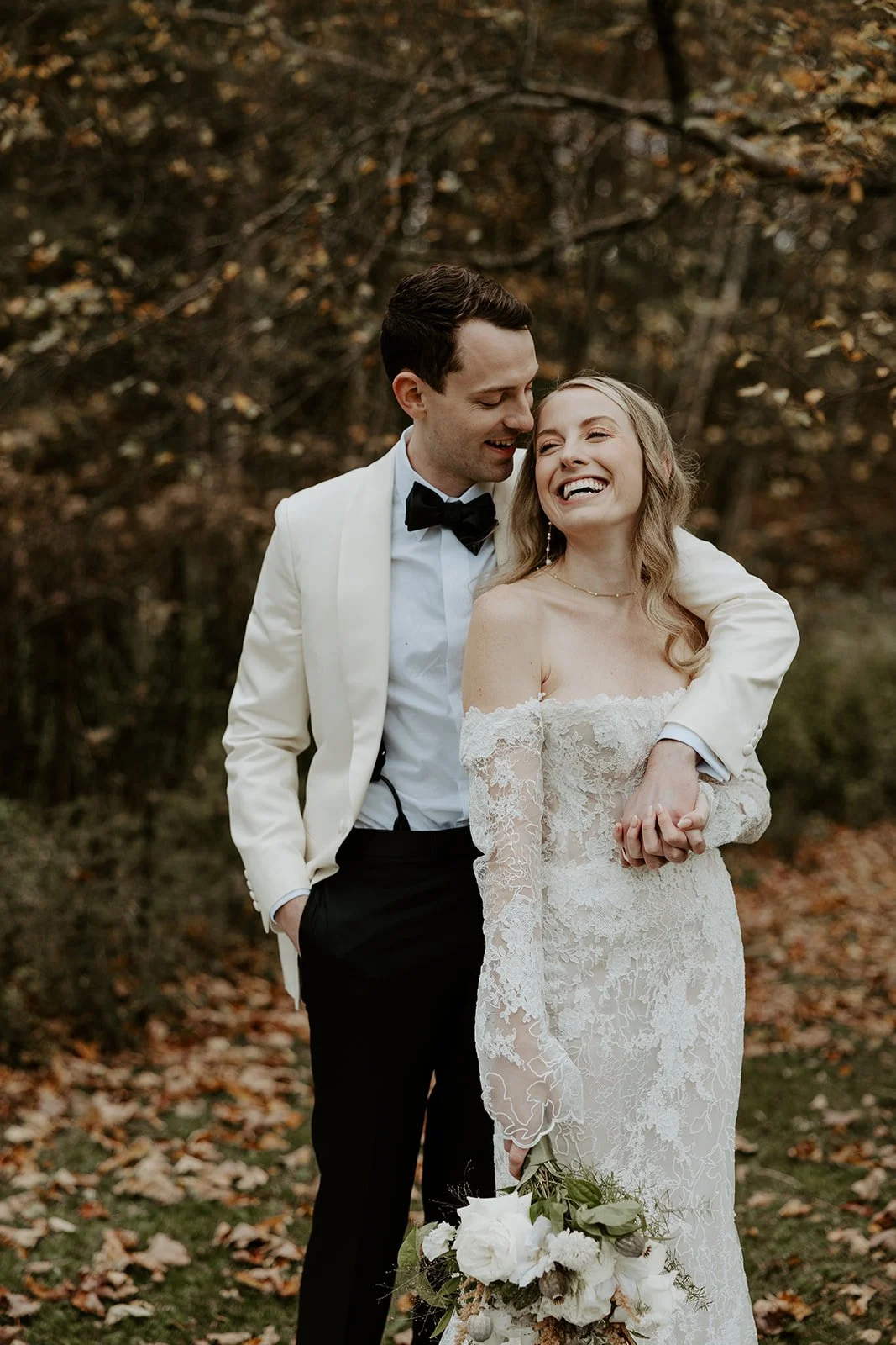 A couple posing for wedding photos