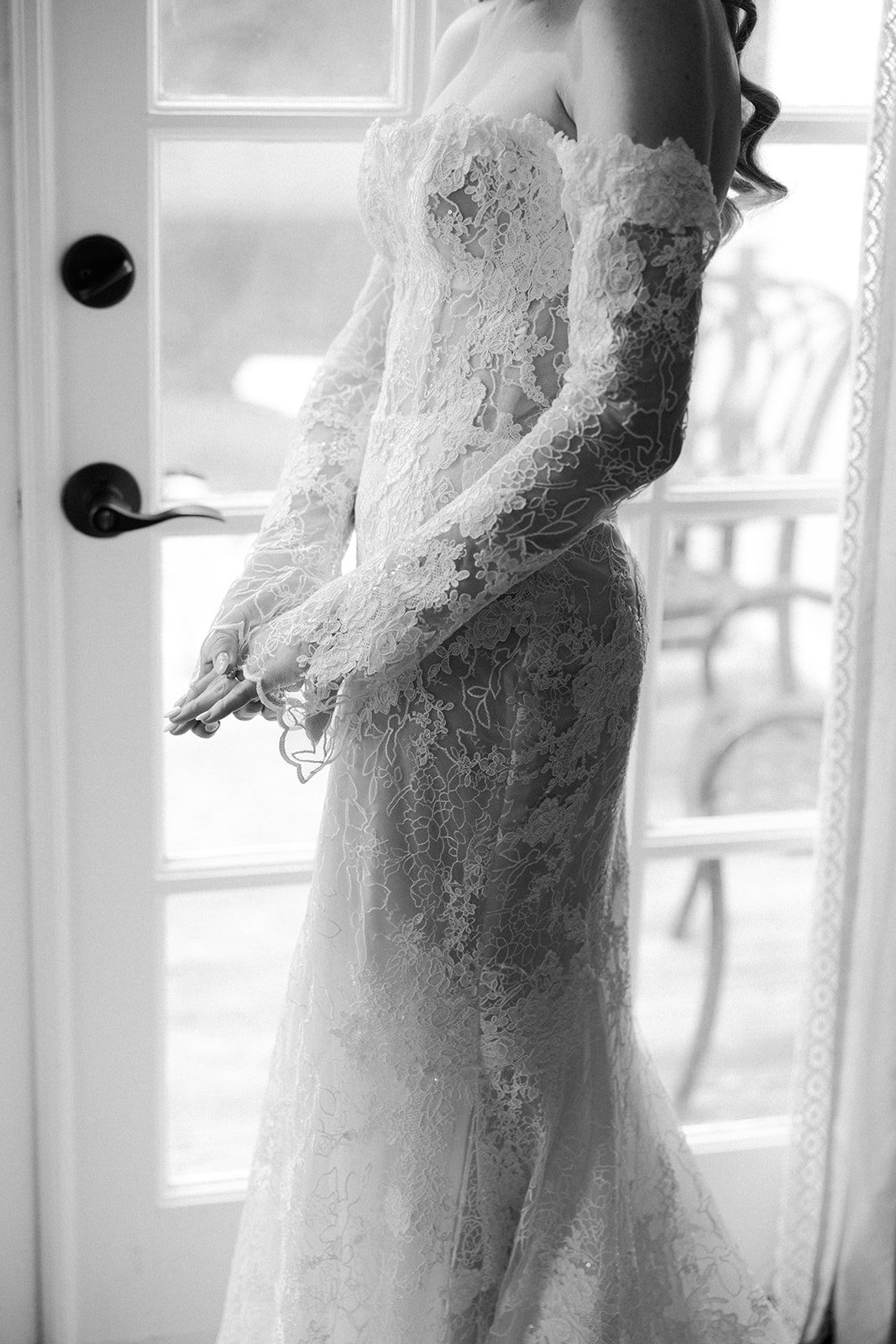A bride's long sleeve fall wedding dress