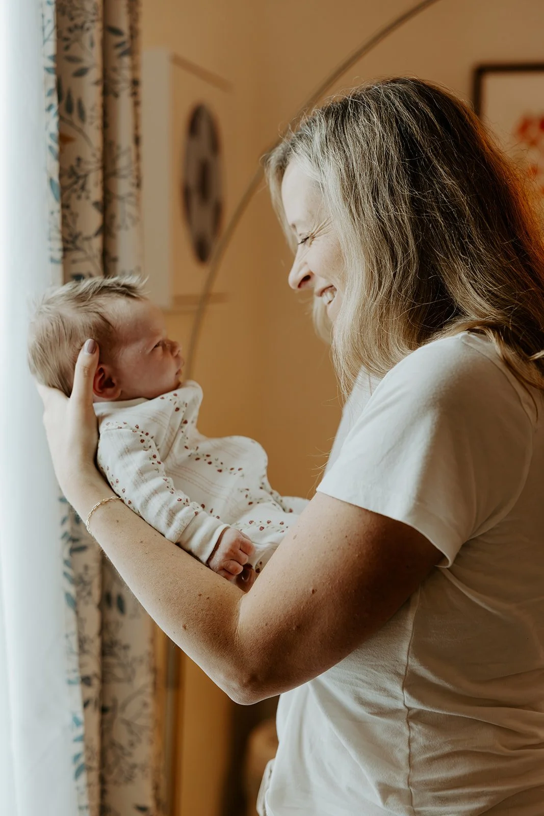 A mom and her newborn baby, by a Boston newborn photographer