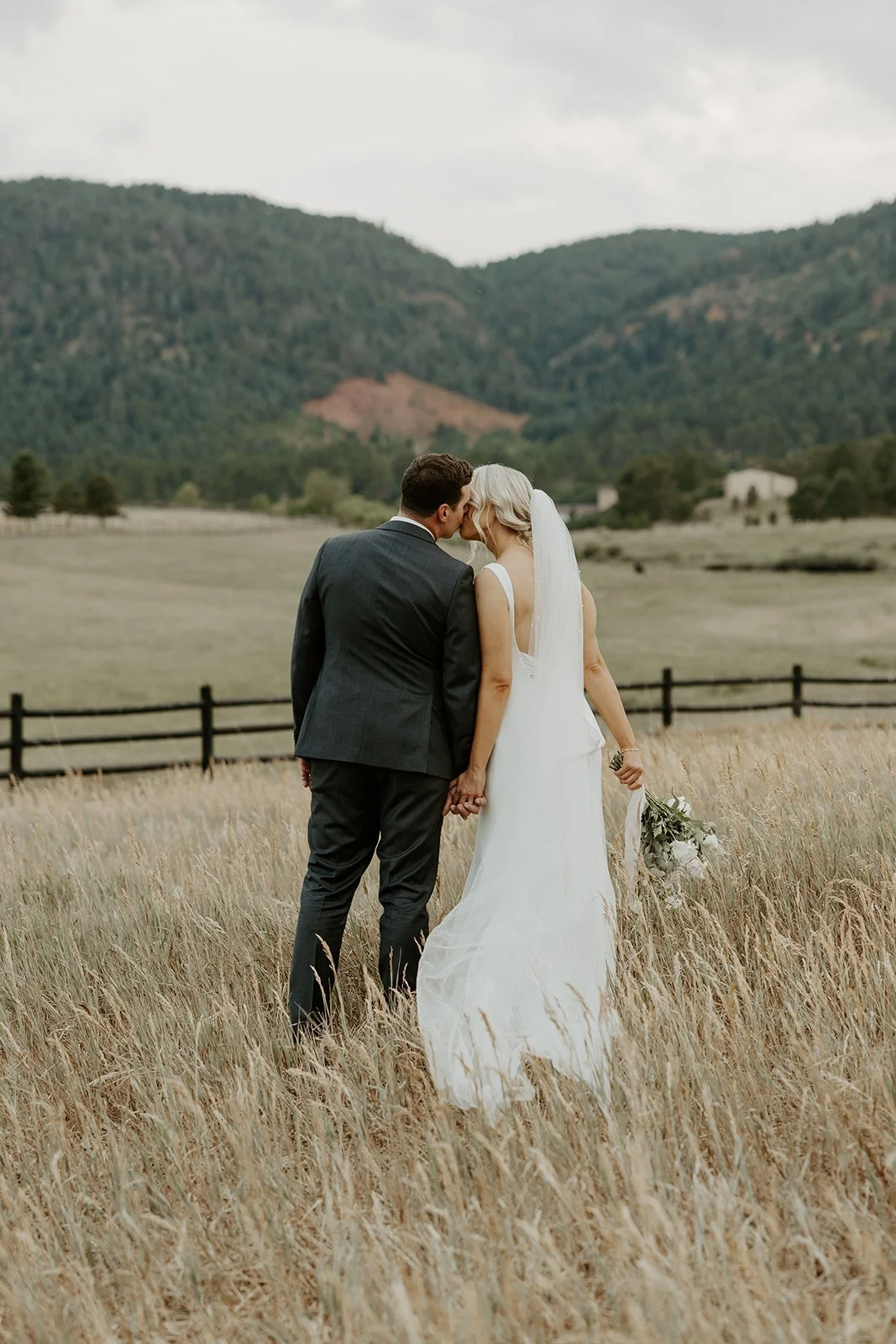 A bride and groom's wedding photos from a mountain elopement