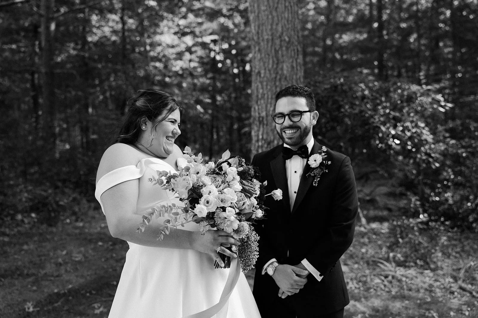 A bride and groom in a candid wedding photo