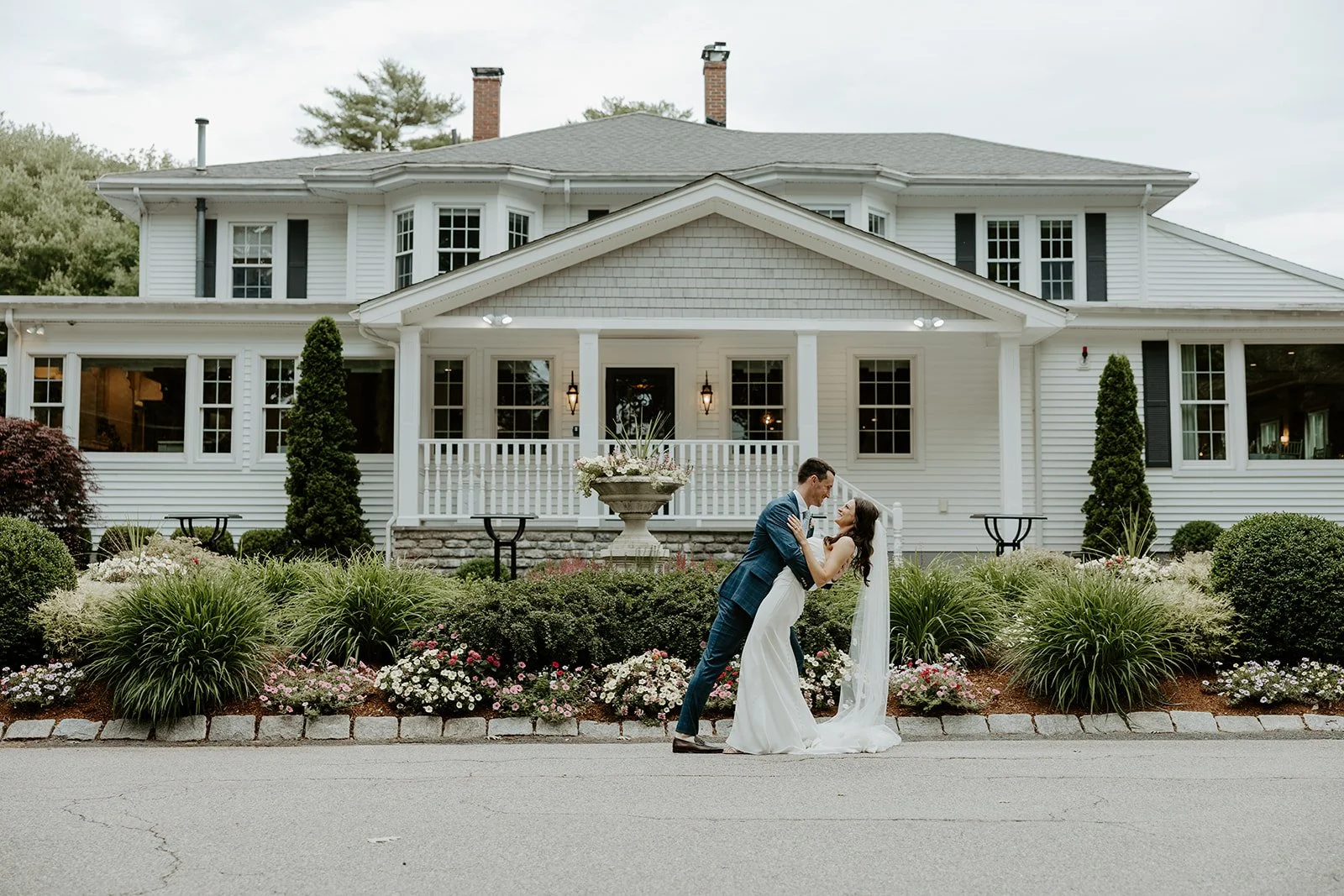 a bride and groom kissing at Saphire Estate